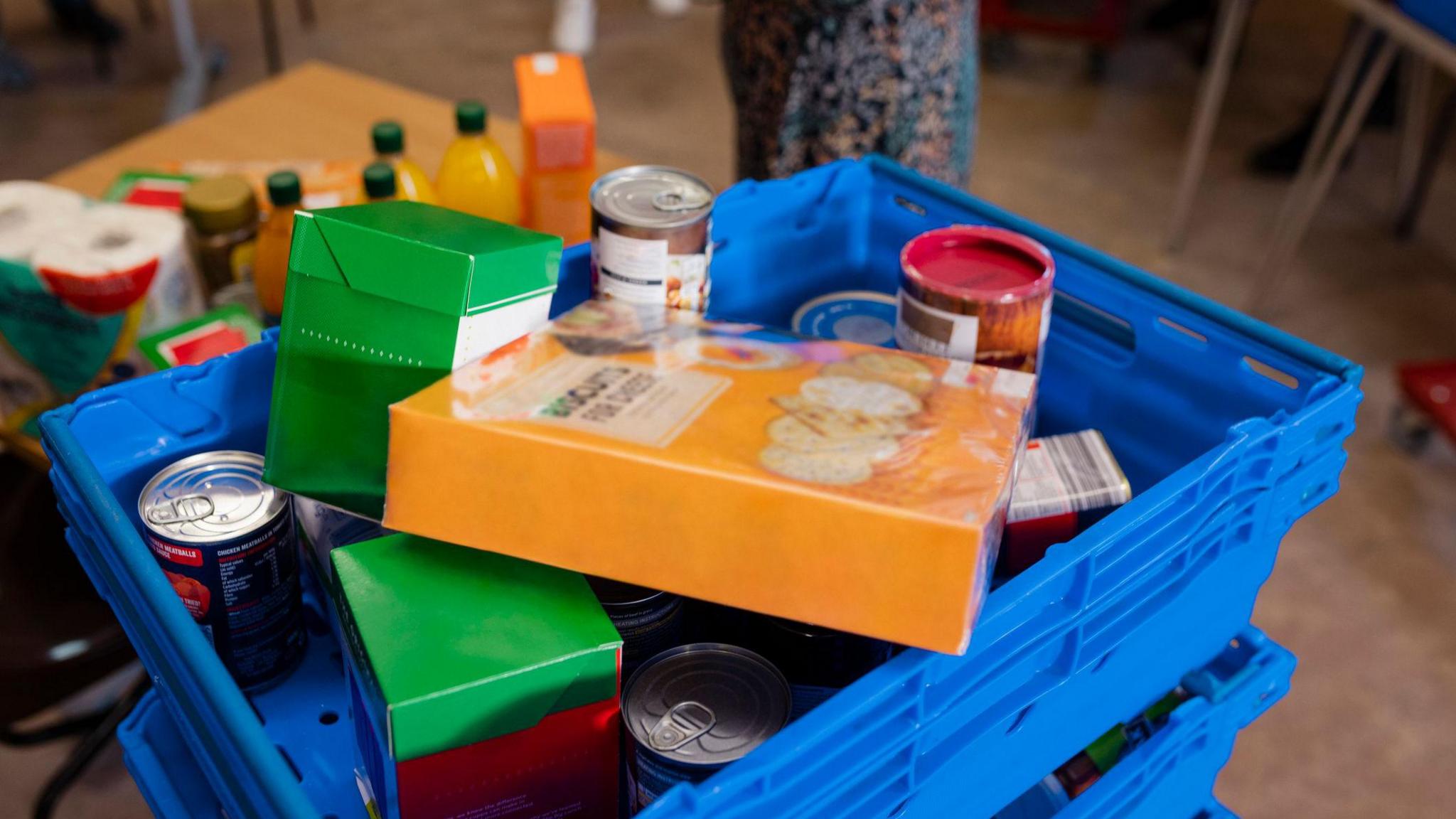 a crate of donated food items