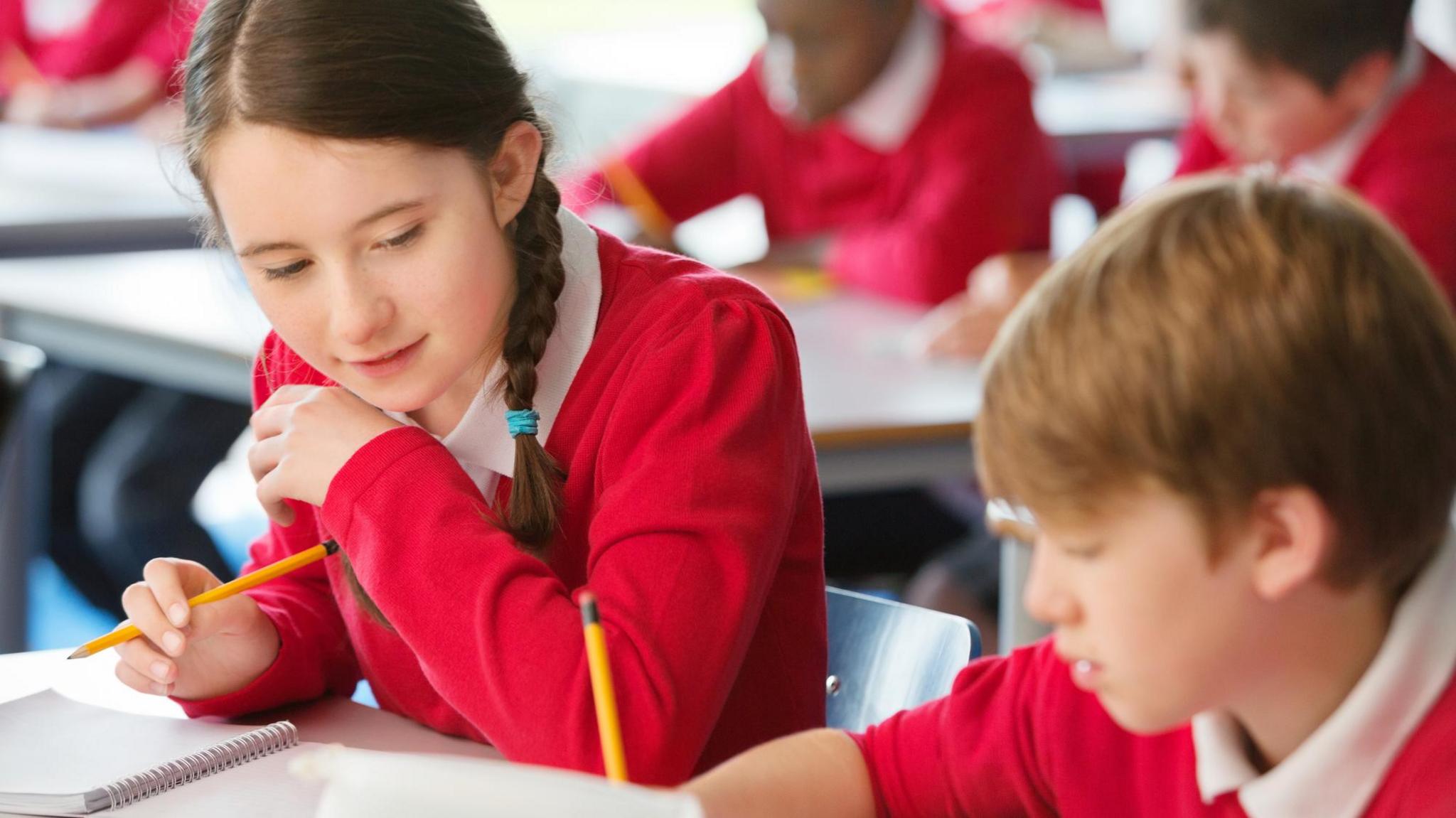 girl and boy in class