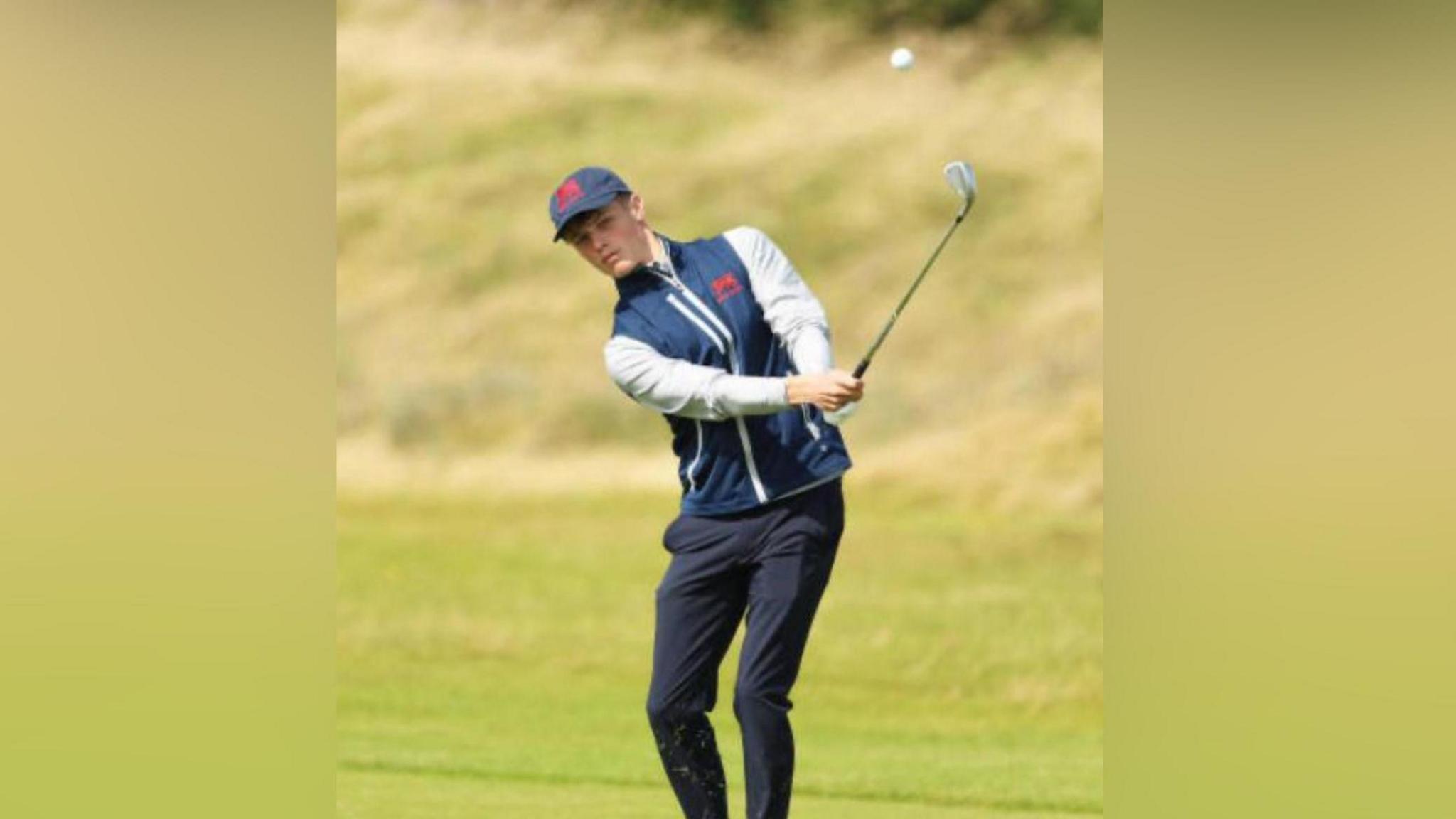 Dion ar y cwrs golff