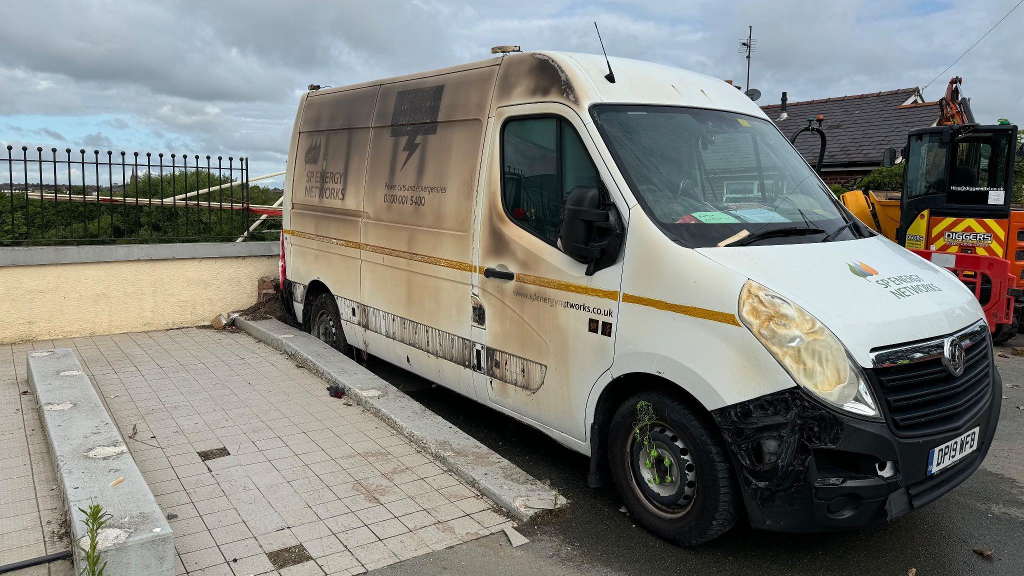 A SP Energy Network work van at the scene of the fire 