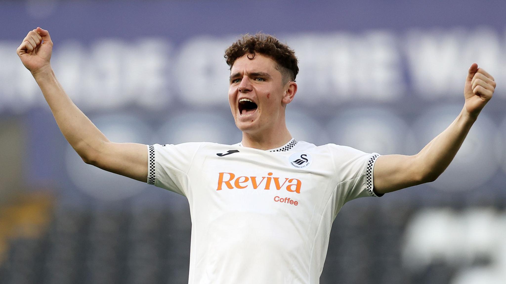 Swansea goal-scorer Bobby Wales celebrates