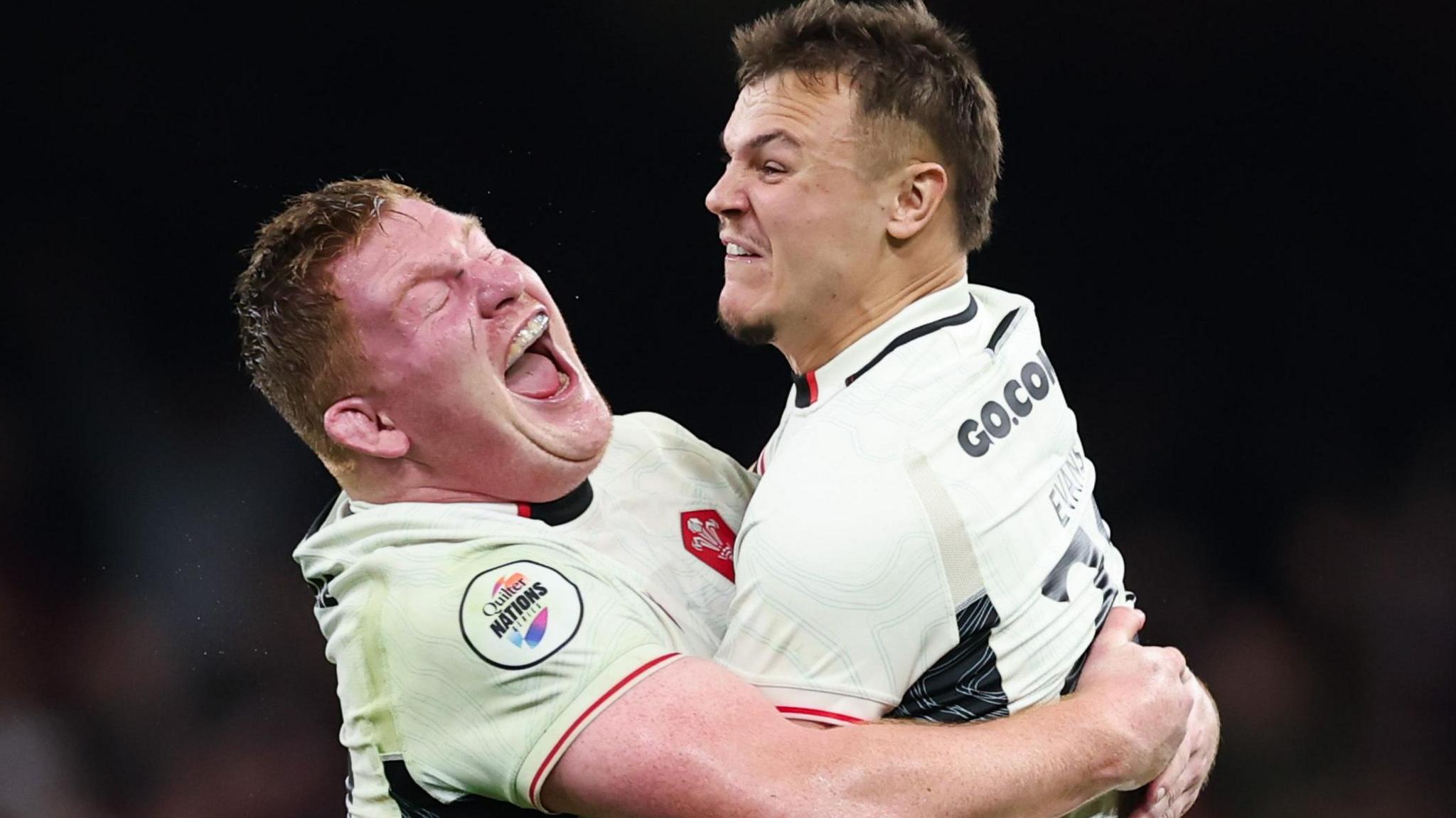 Wales fly-half Jarrod Evans is congratulated by prop Rhys Carre with both players having previously played for Cardiff
