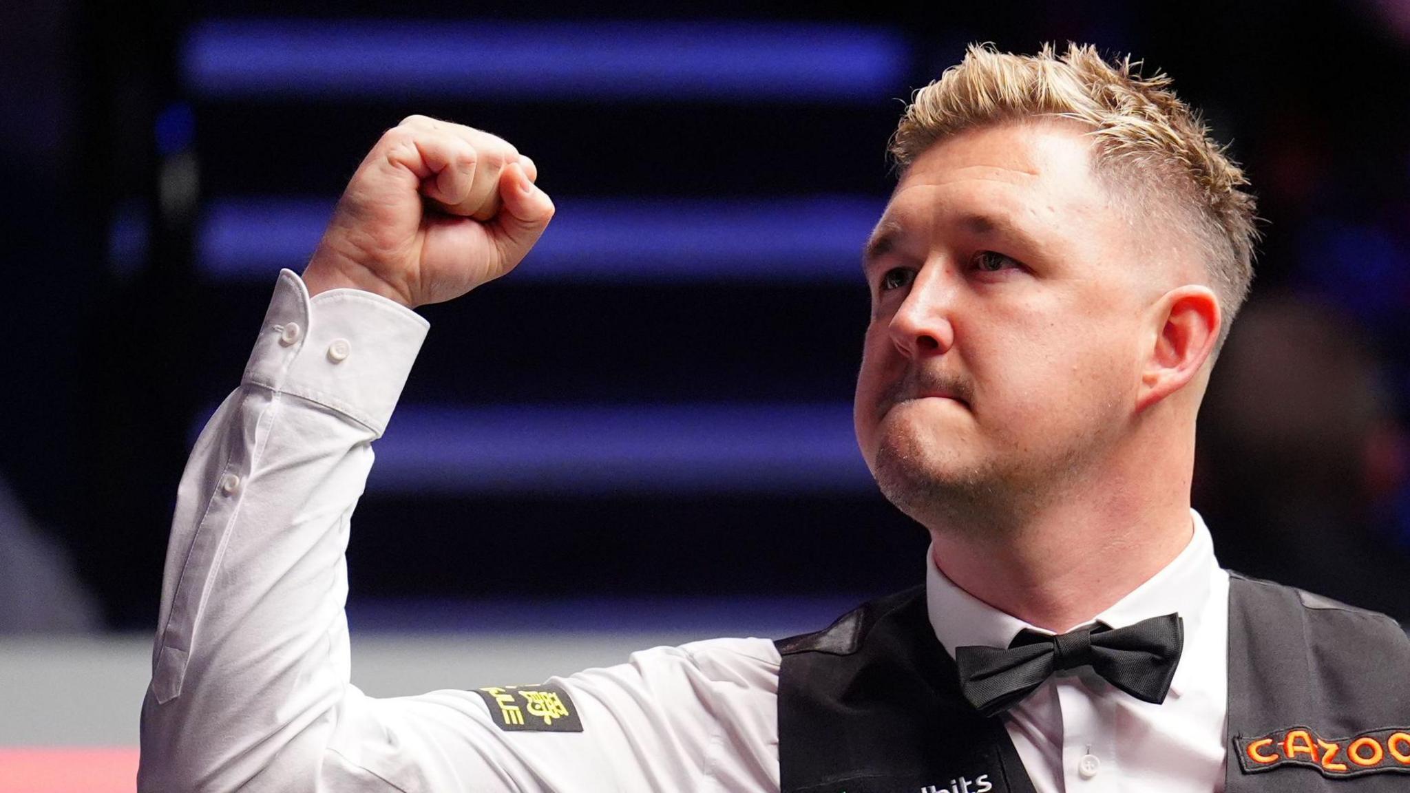 Kyren Wilson celebrates after beating David Gilbert