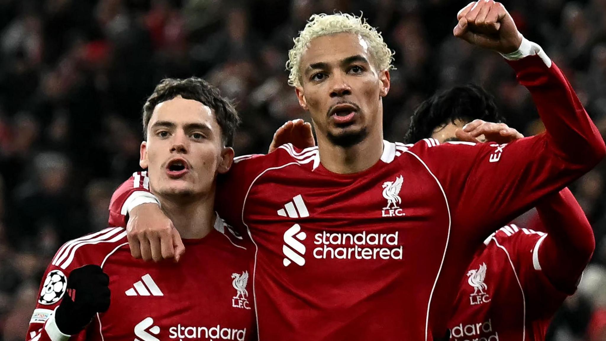 Hugo Ekitike and Florian Wirtz embrace