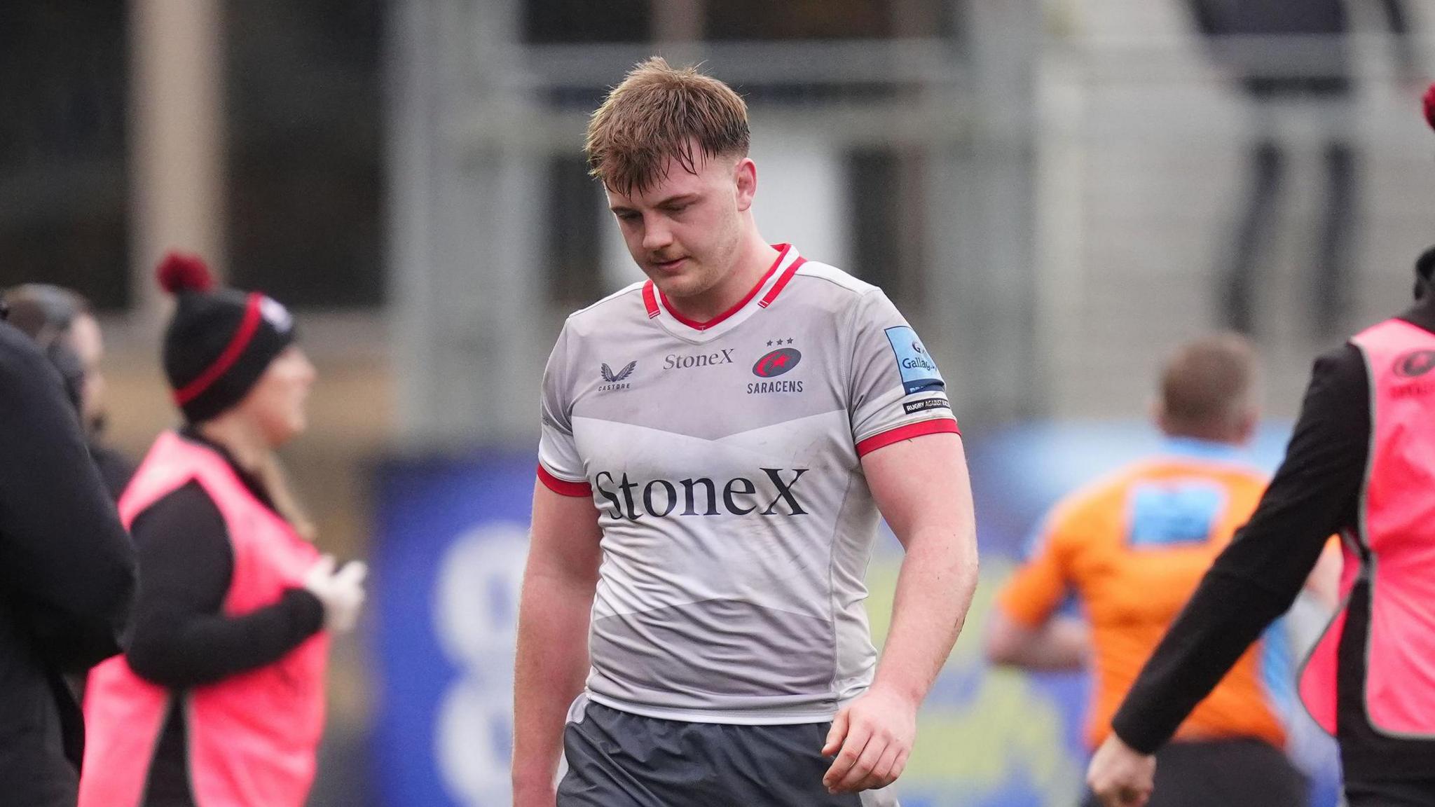 Toby Knight leaving the field after being shown a red card