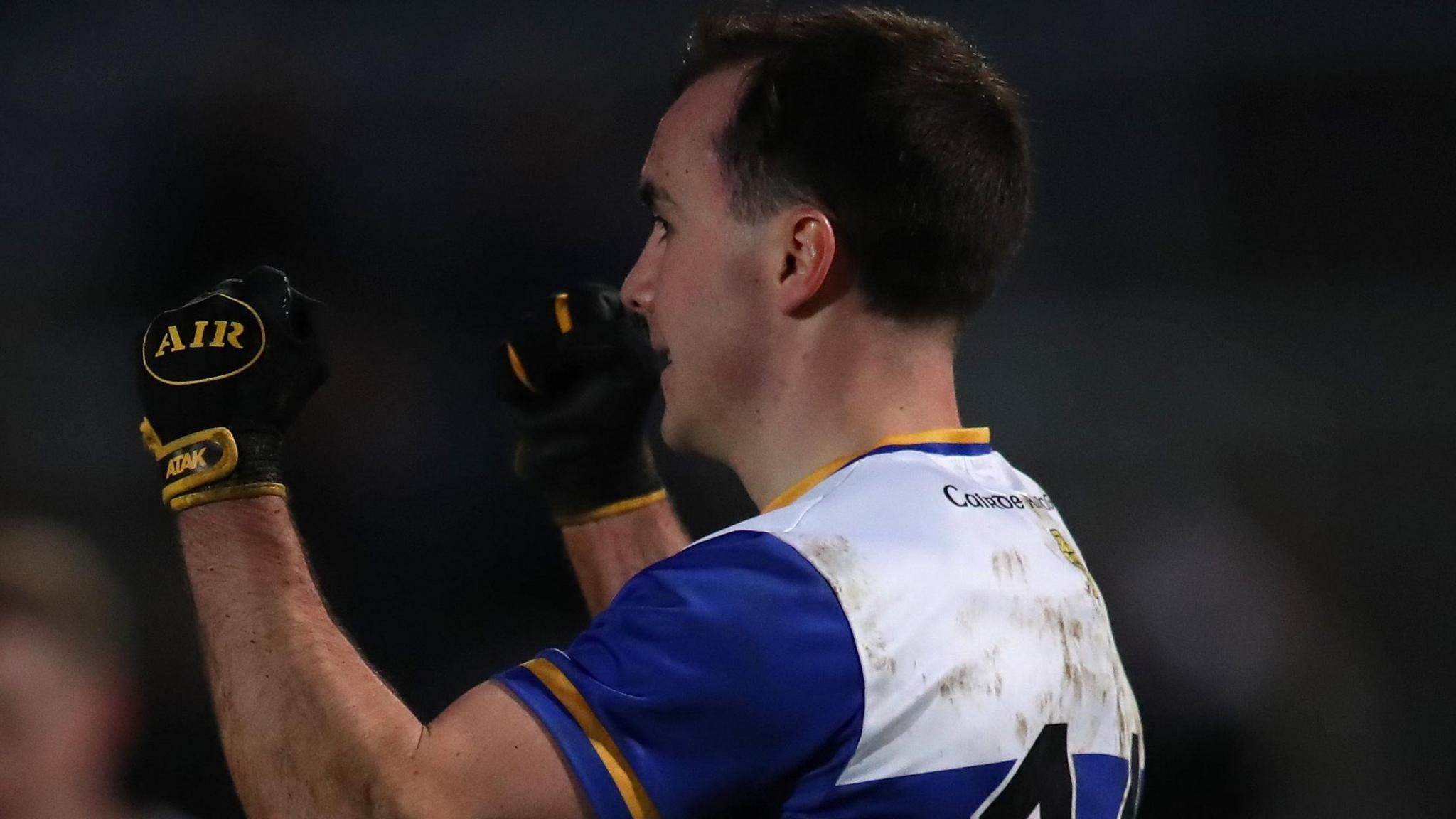 Errigal Ciaran captain Darragh Canavan celebrates after the team's one-point win over Clann Eireann in Newry