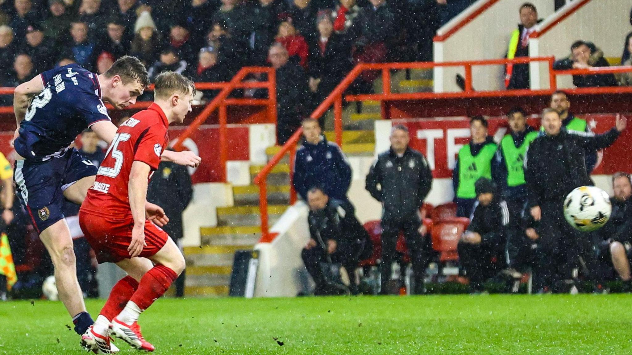 Dundee's Ethan Hamilton scores against Aberdeen