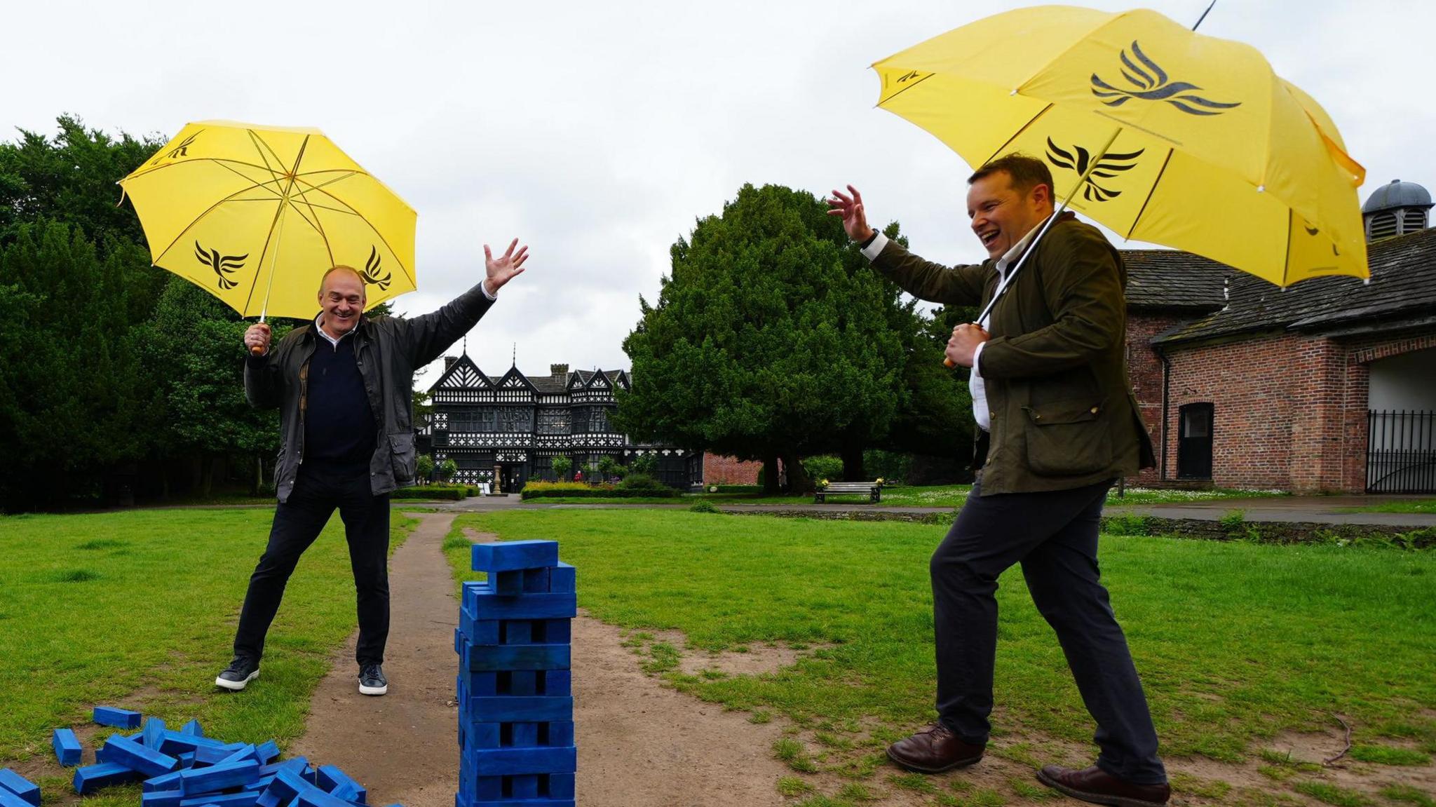 Liberal Democrats leader Sir Ed Davey and Liberal Democrat Parliamentary Candidate for Cheadle, Tom Morrison play Jenga during a visit to Cheadle