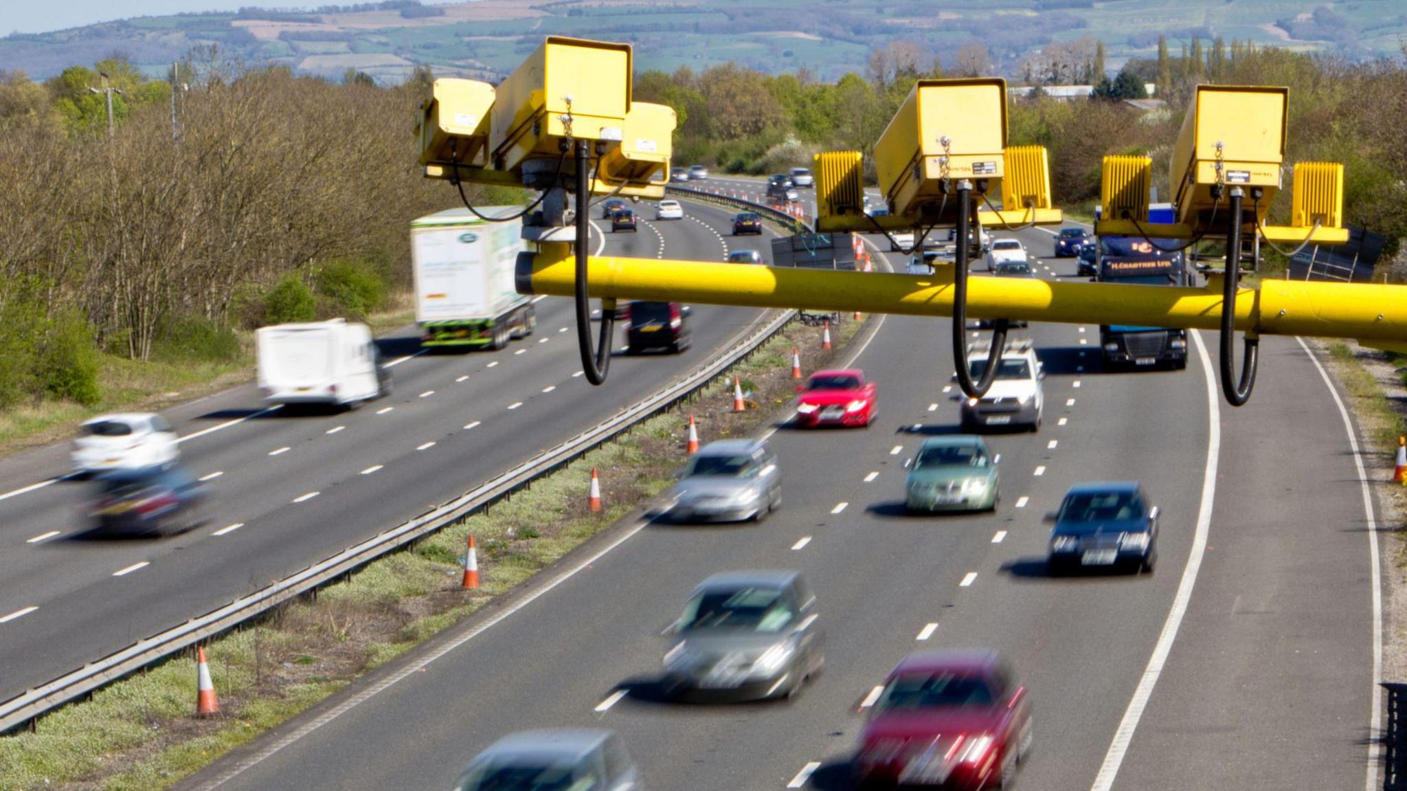 A traffic camera watching traffic below