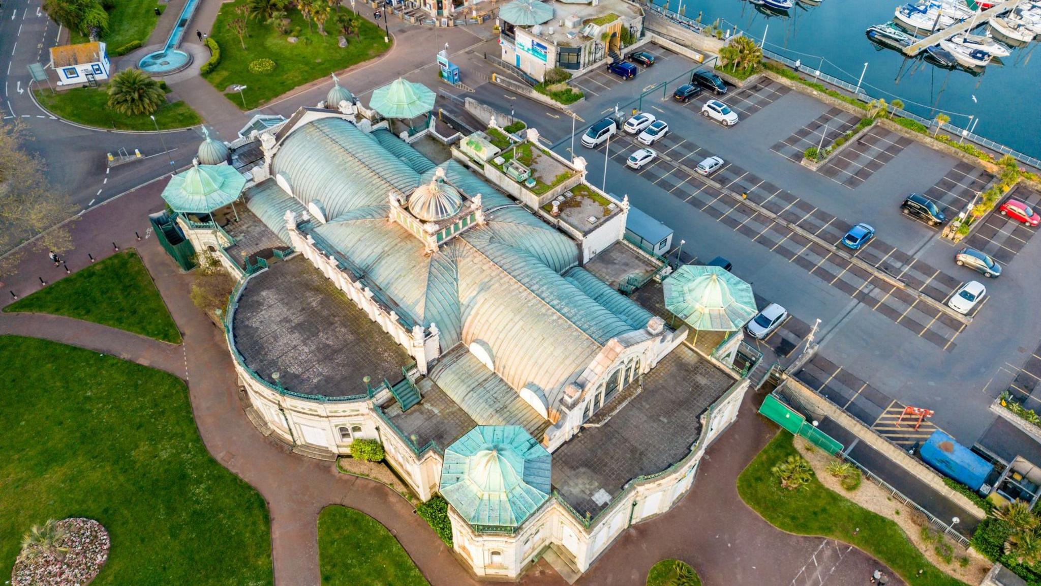 Aerial view of the Torquay Pavilion with a car park to the right 