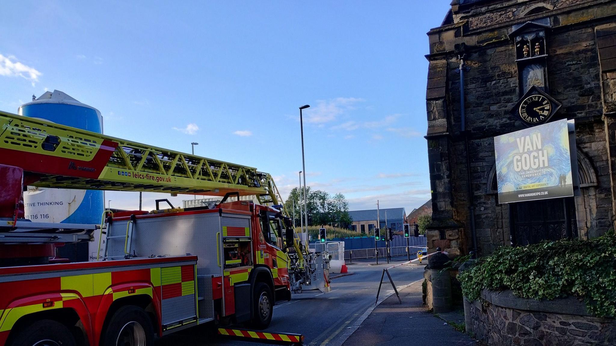 Fire engine outside a church in the centre of Leicester