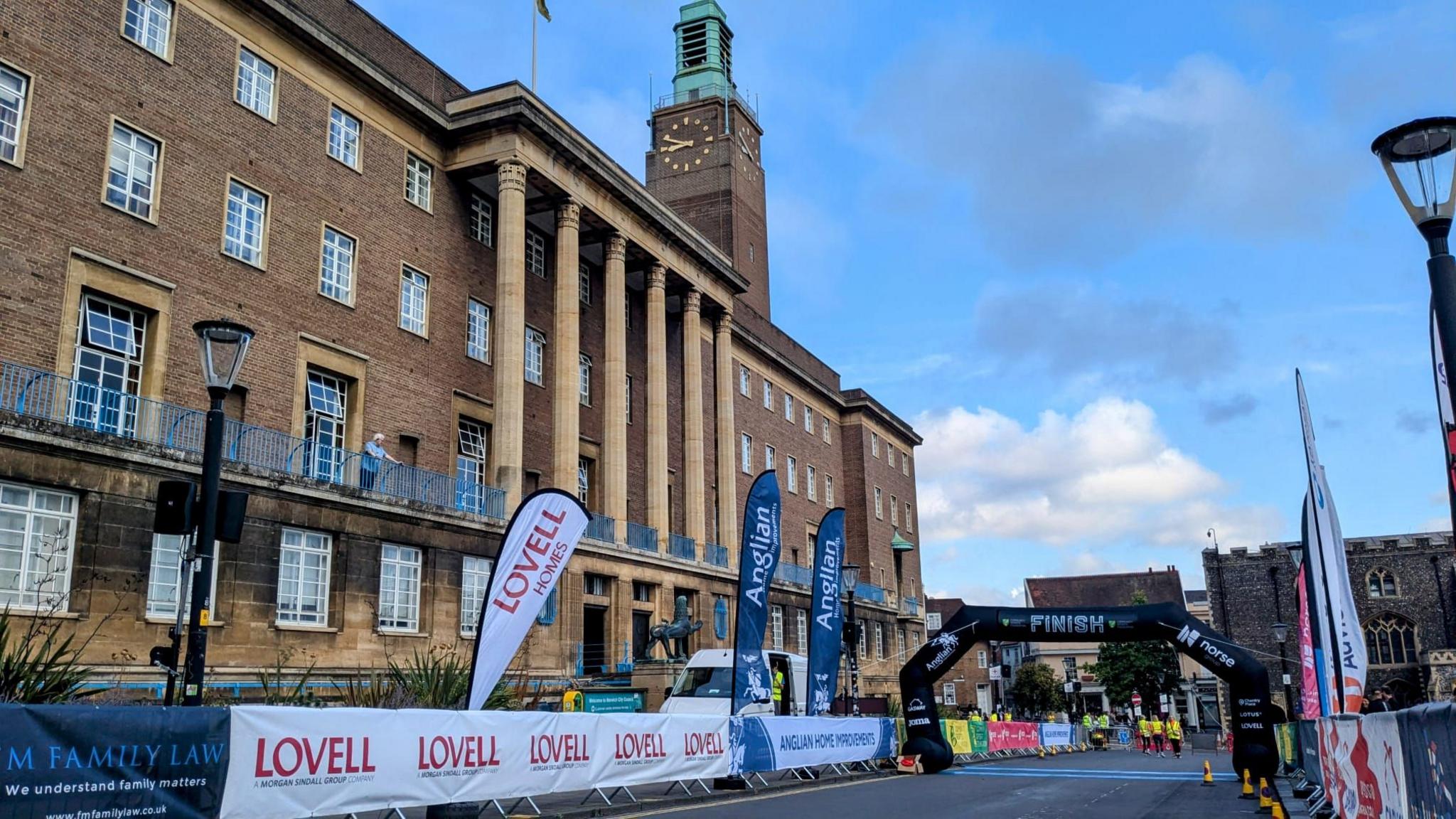 A finish line arch outside Norwich City Hall