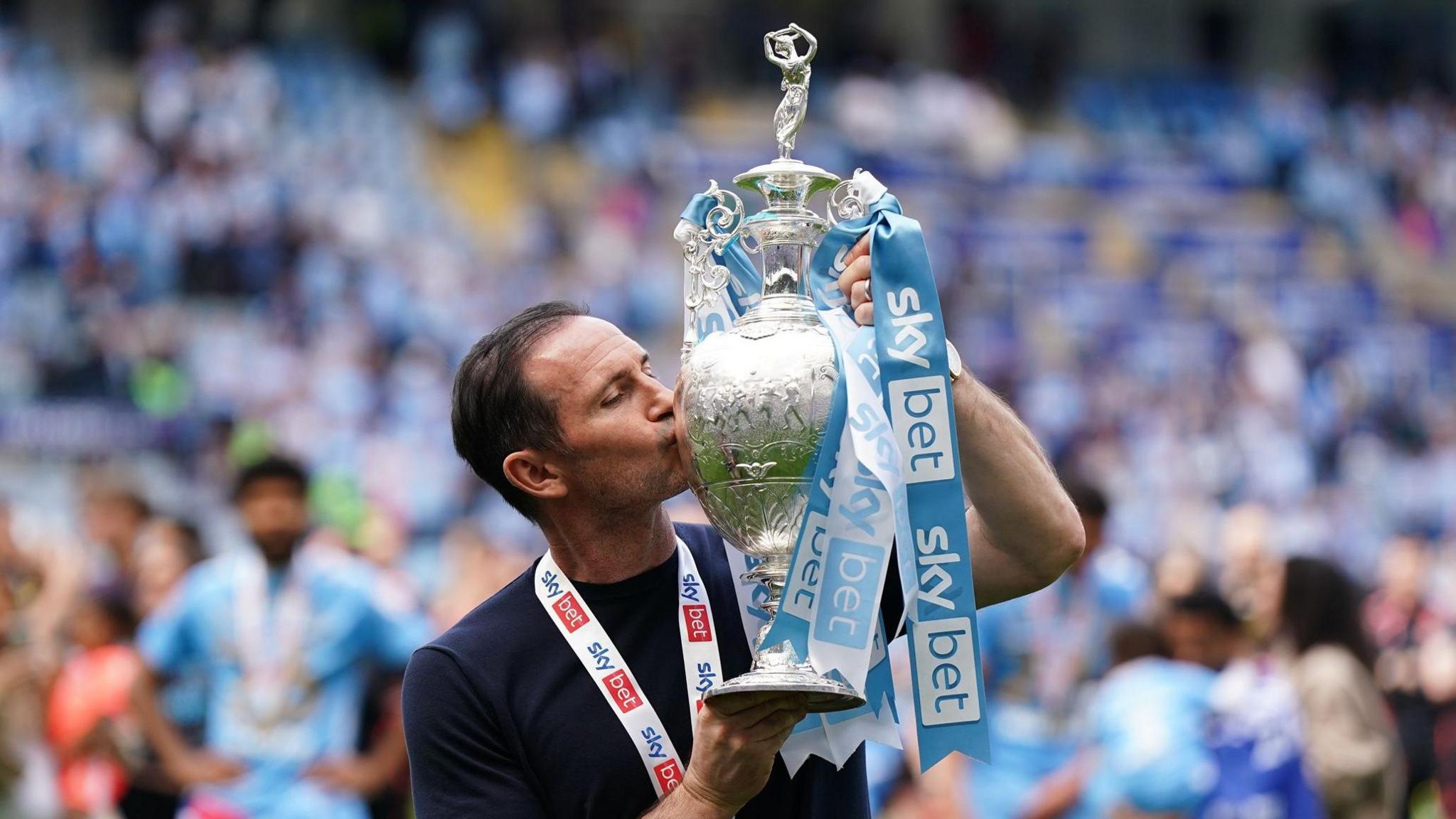 Coventry manager Frank Lampard celebrates winning the Championship
