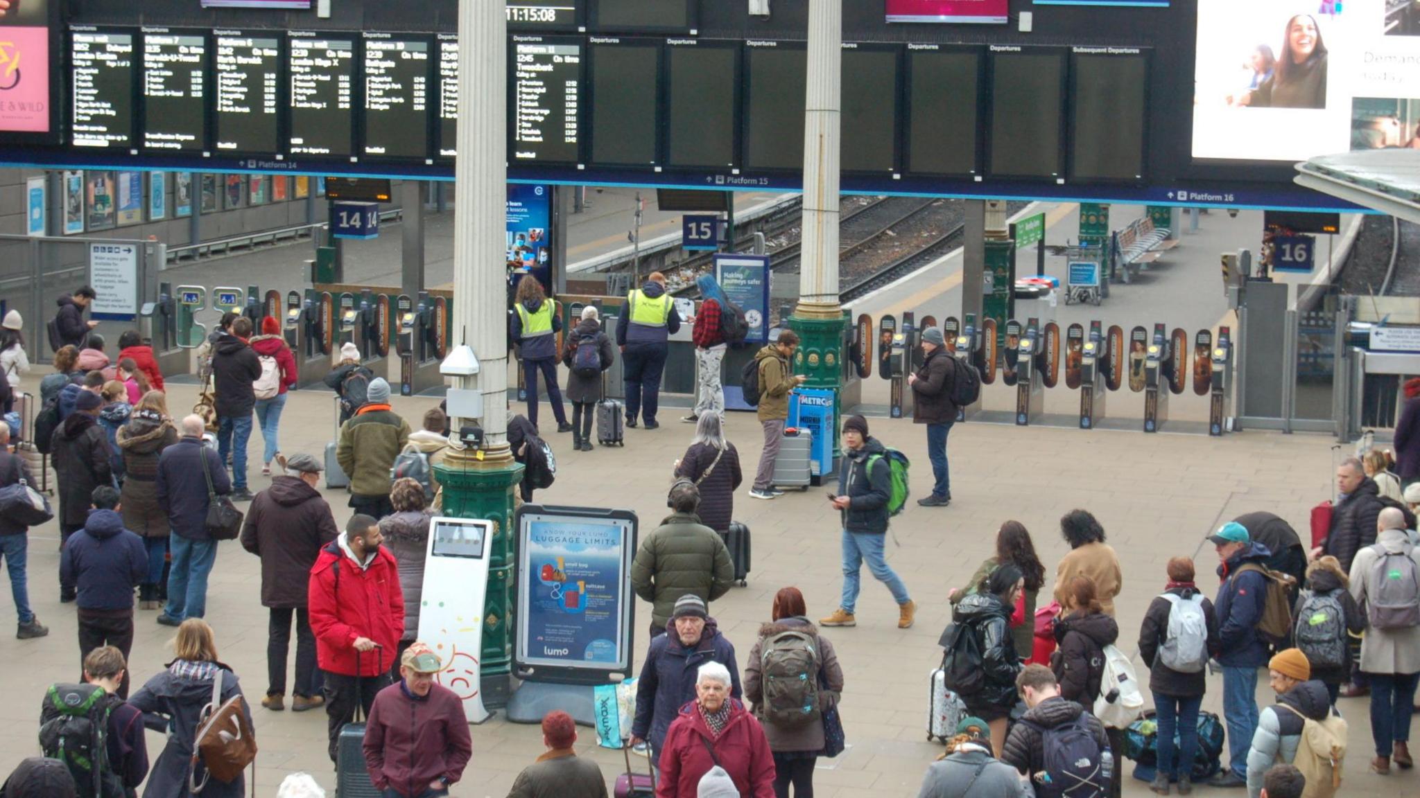 Passengers at Waverley Station in Edinburgh