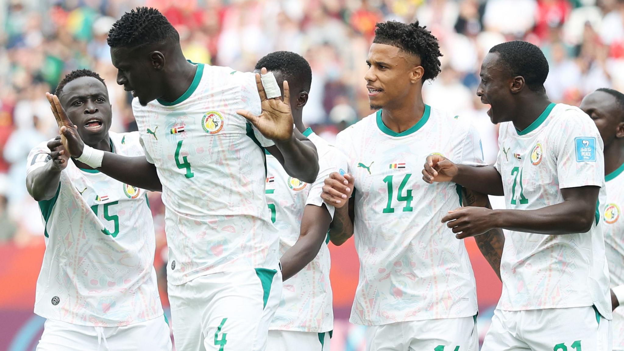  Habib Diarra and Senegal team-mates celebrate their opening goal