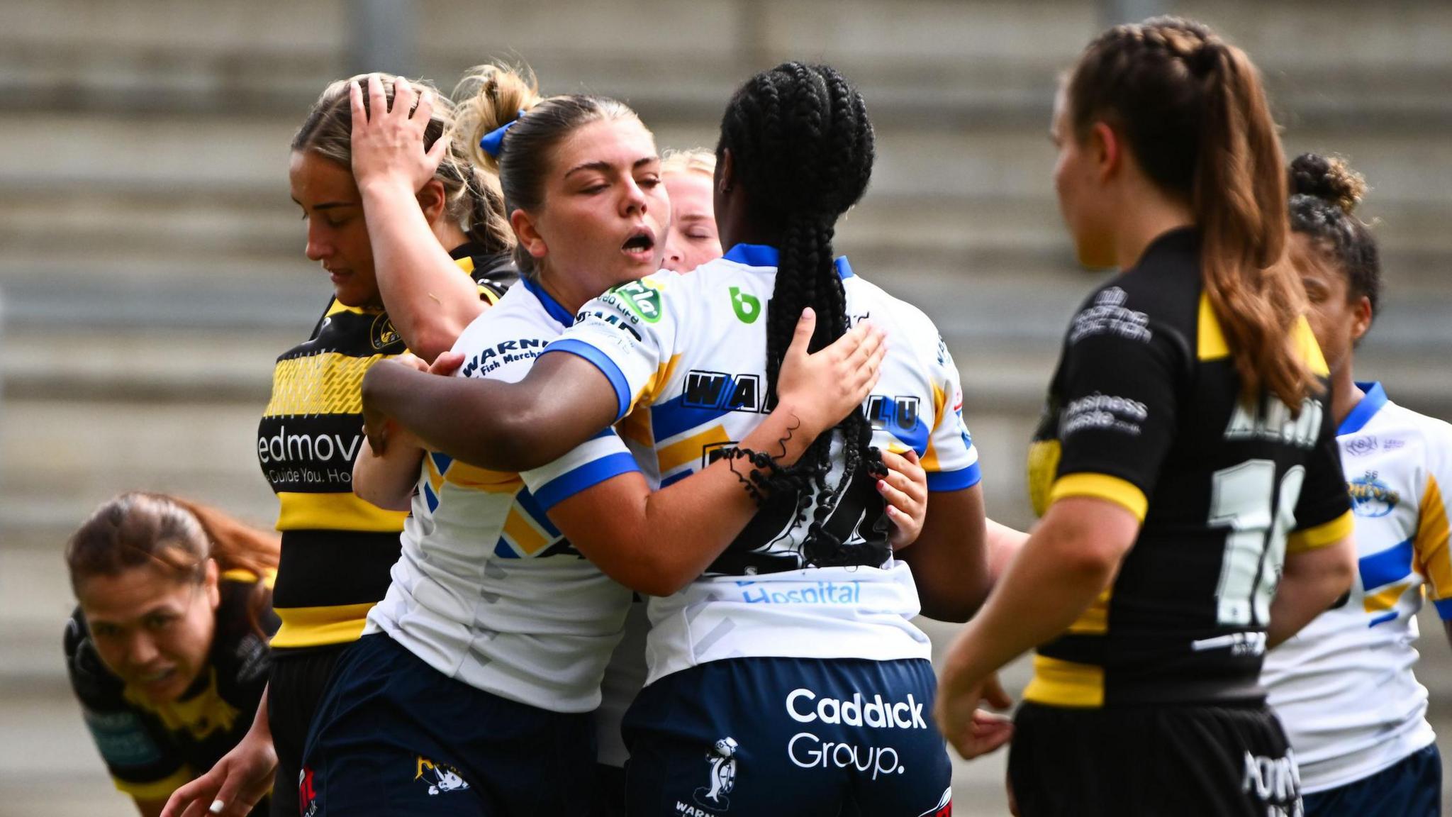 Grace Short of Leeds celebrating her try