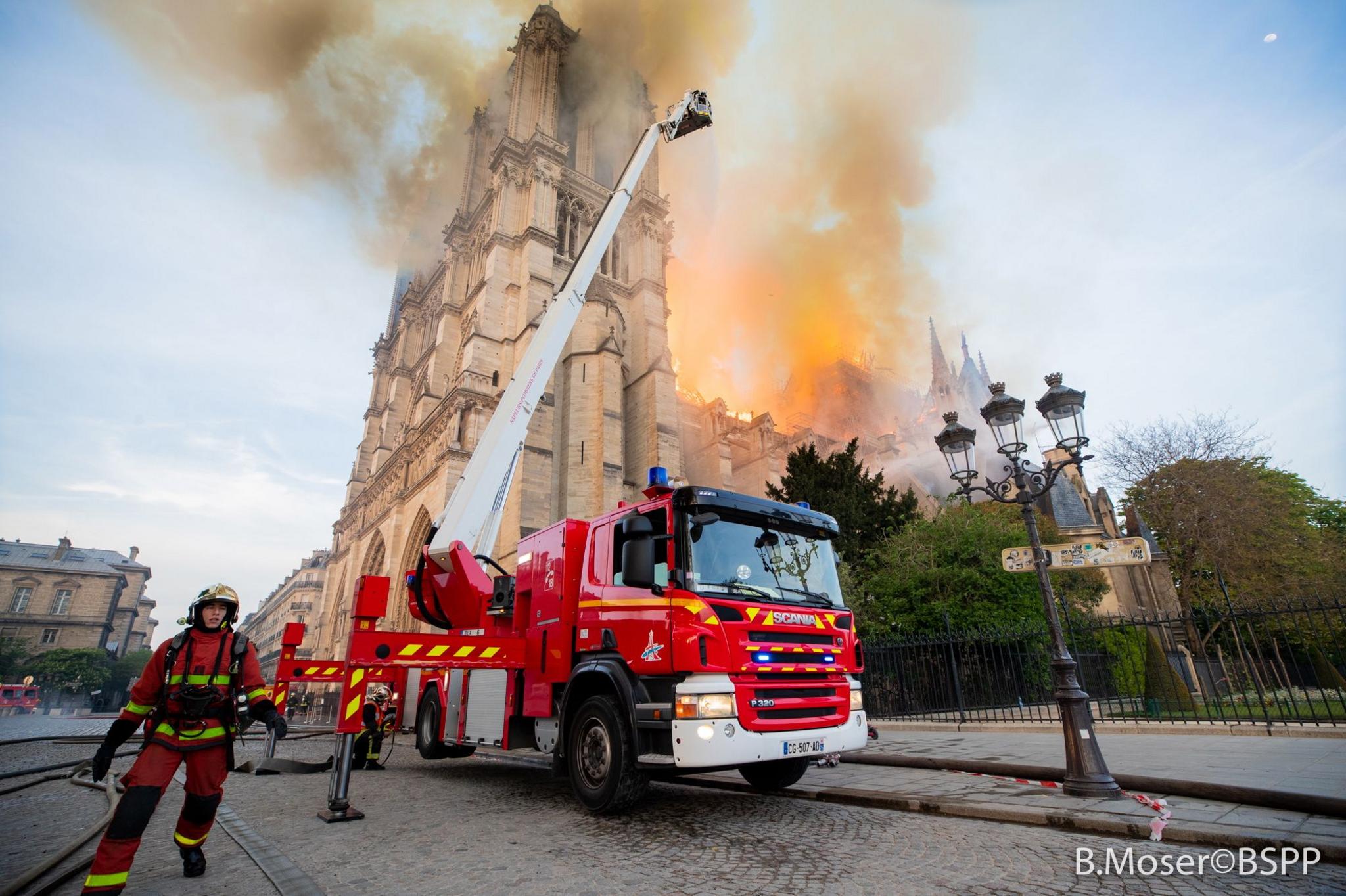 Image shows a fire engine in front of Notre-Dame whilst it was on fire. 