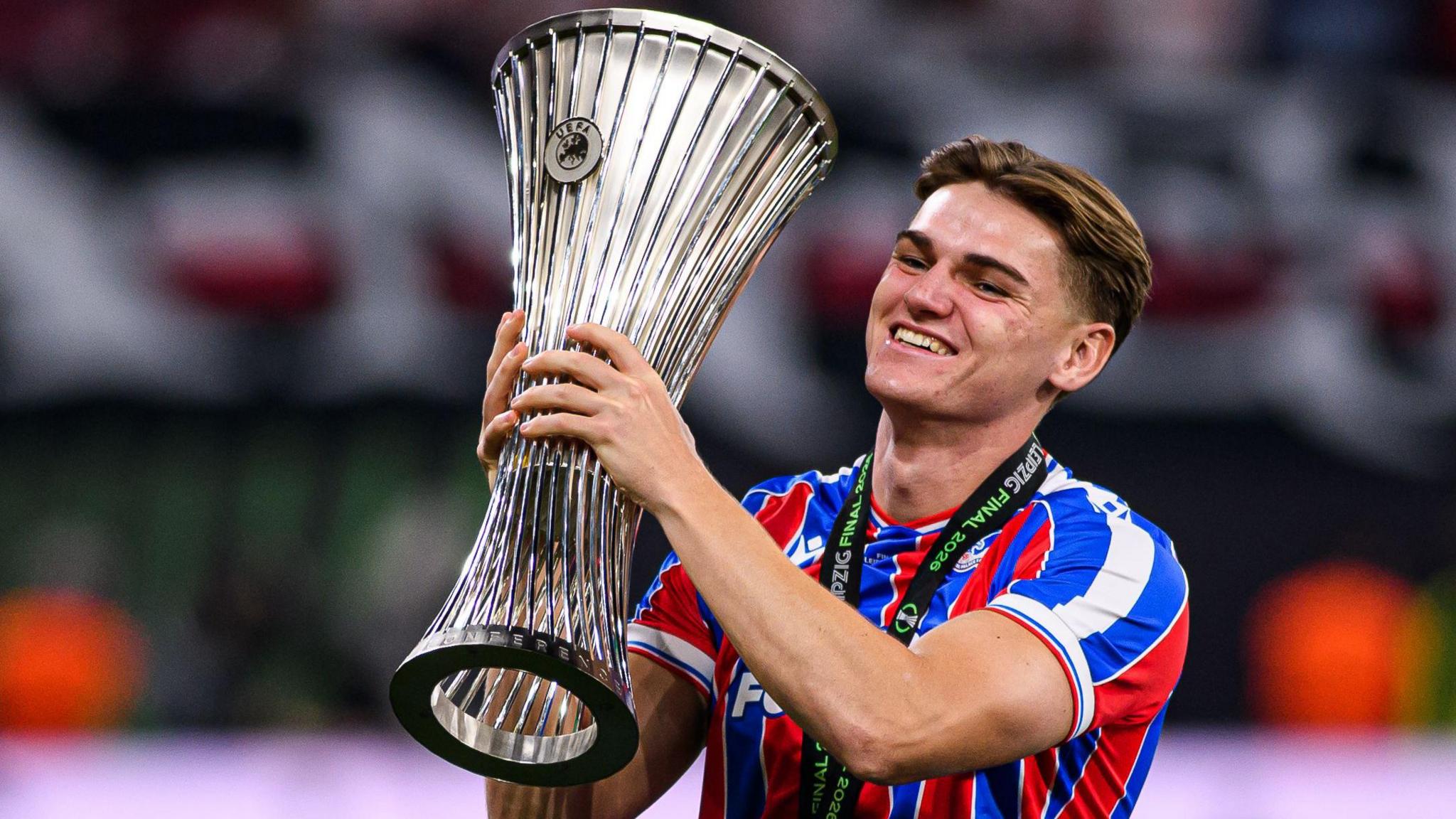 Justin Devenny with the Uefa Conference League trophy