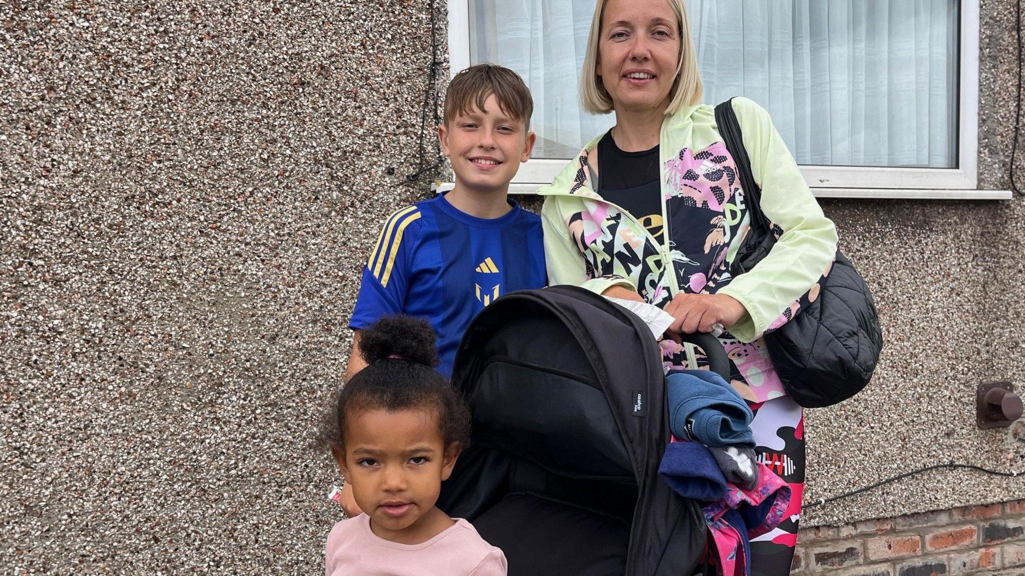 Baiba Lauksteine with her two children