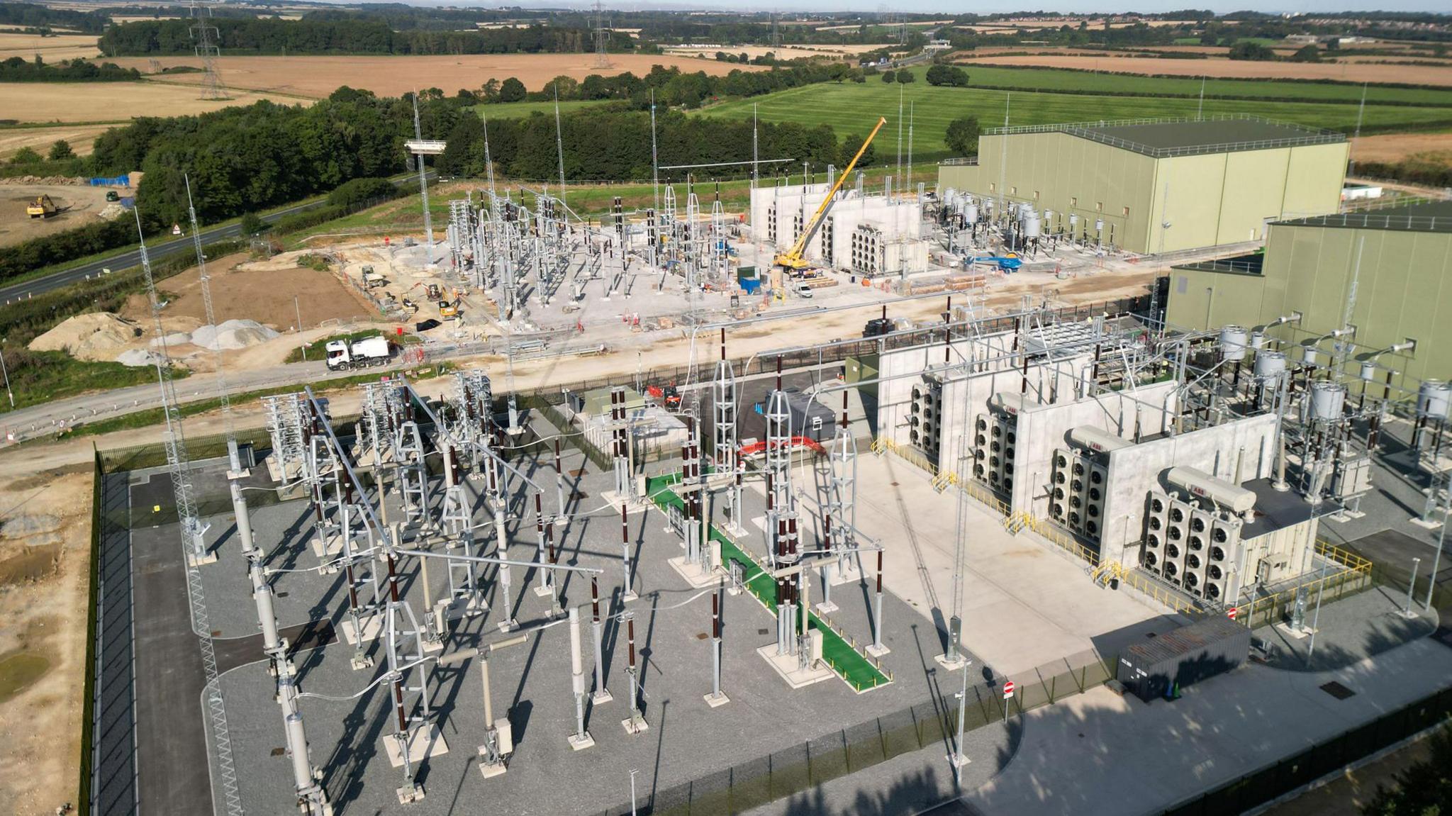 A construction site showing building of the electricity converter station in progress