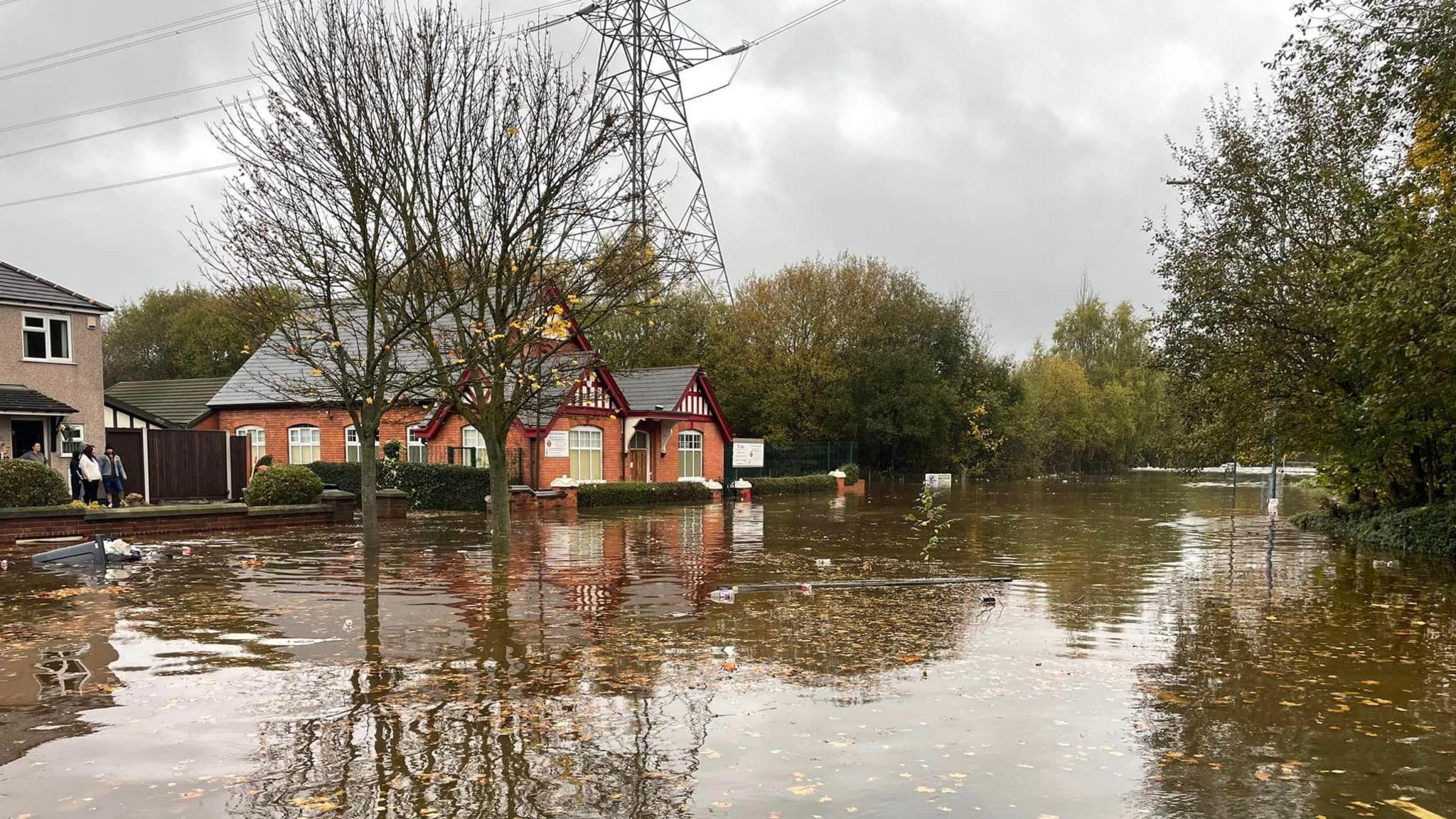 Lea Brook Methodist Church, a red brick building, will flood water across the road in front 