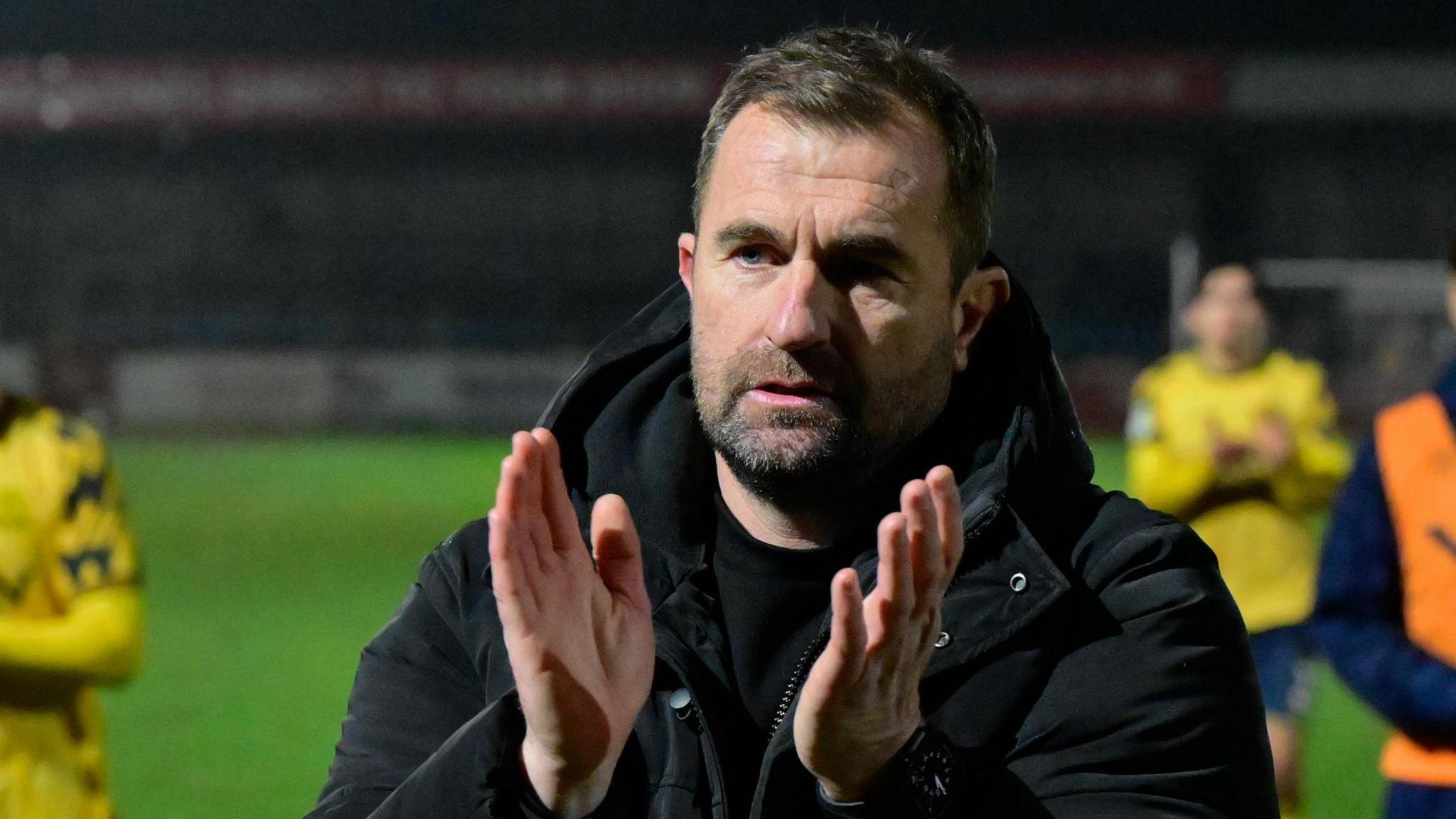 Paul Wotton applauds the Torquay fans
