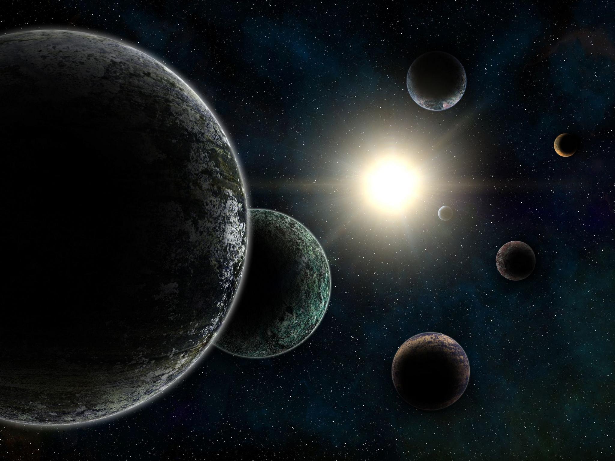 Artistic impression of Several exoplanets with a star in the distance. 