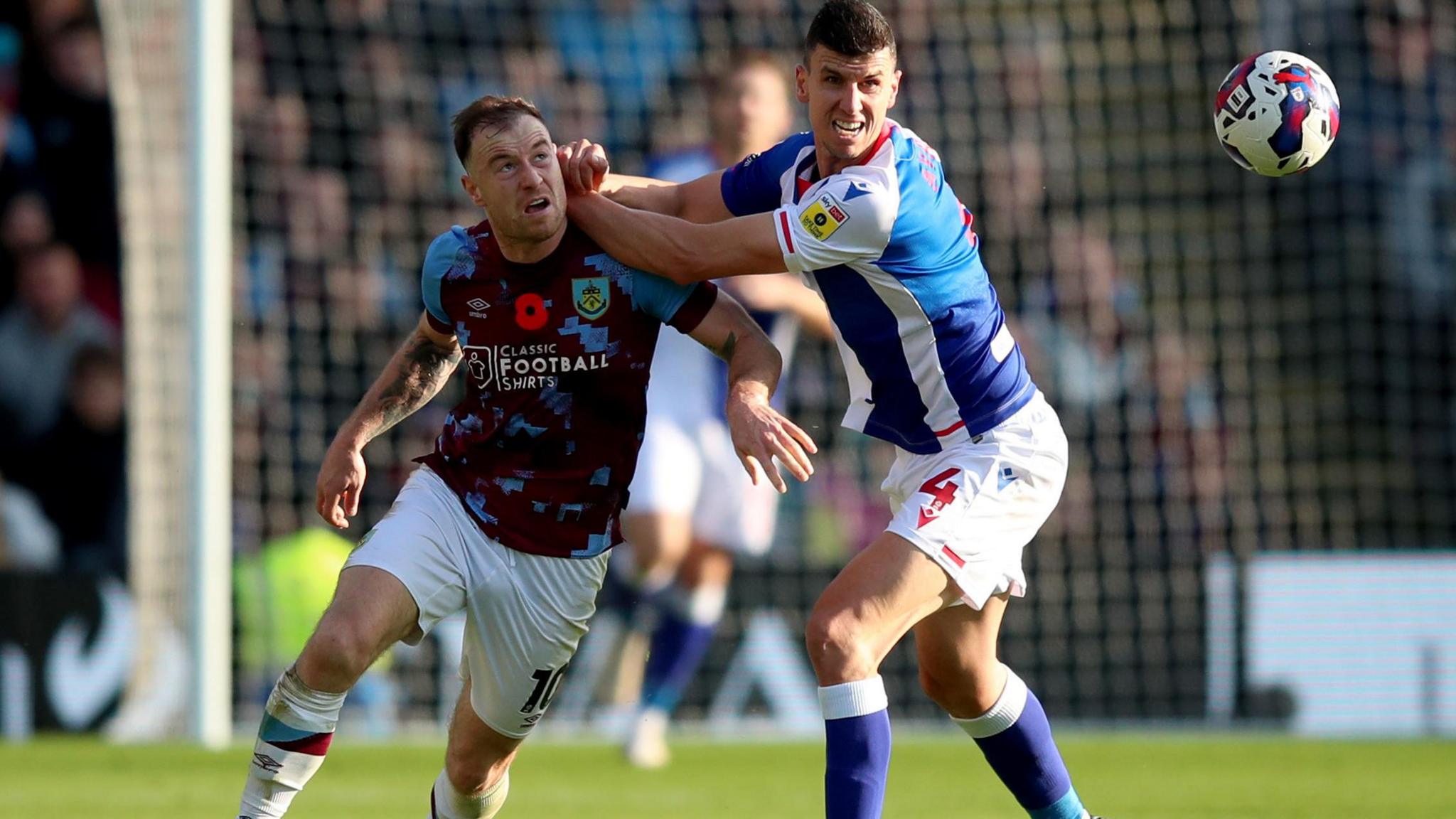 Burnley’s Ashley Barnes battles with Blackburn Rovers' Daniel Ayala 