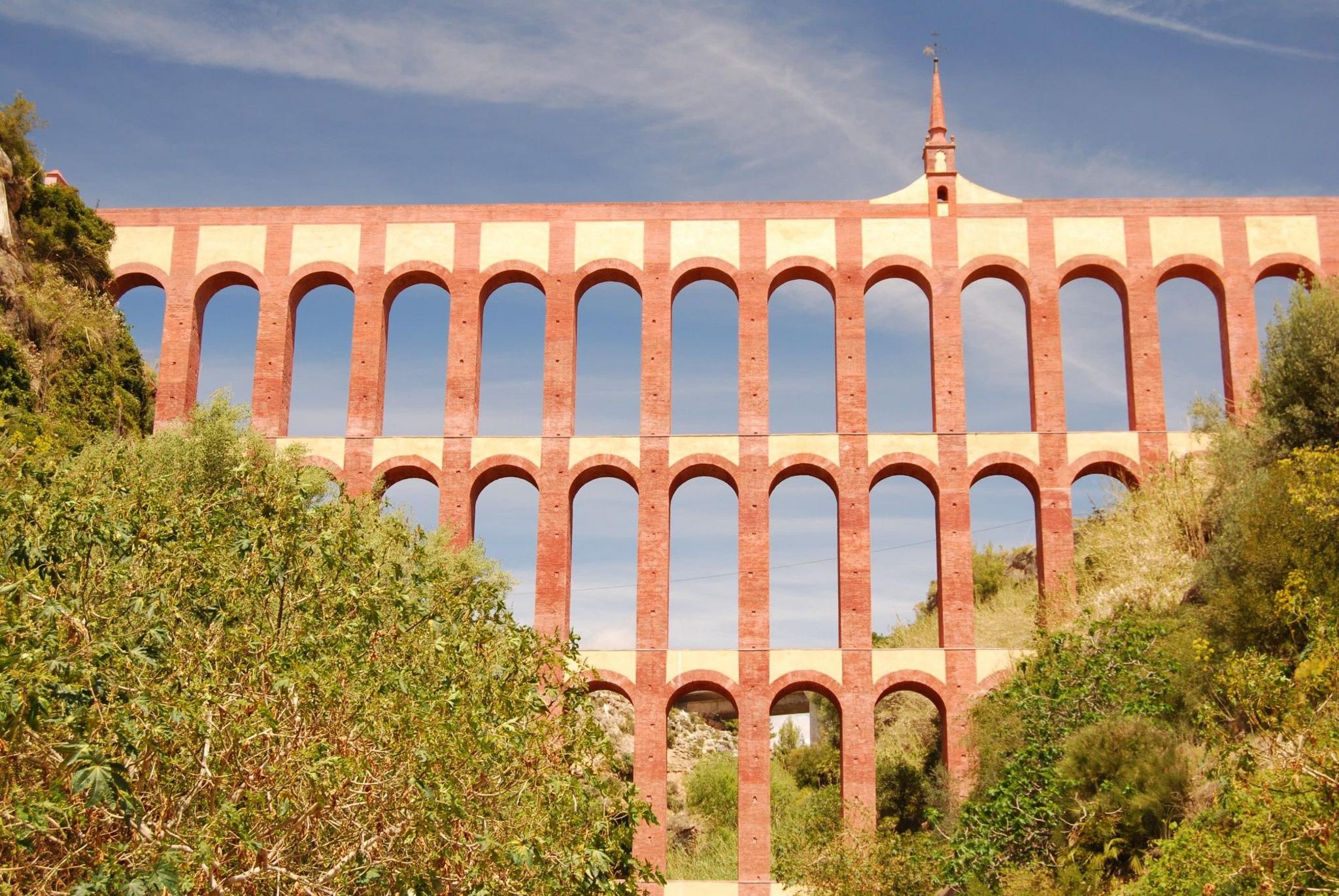 The brick arches of a viaduct located in a gorge in southern Spain