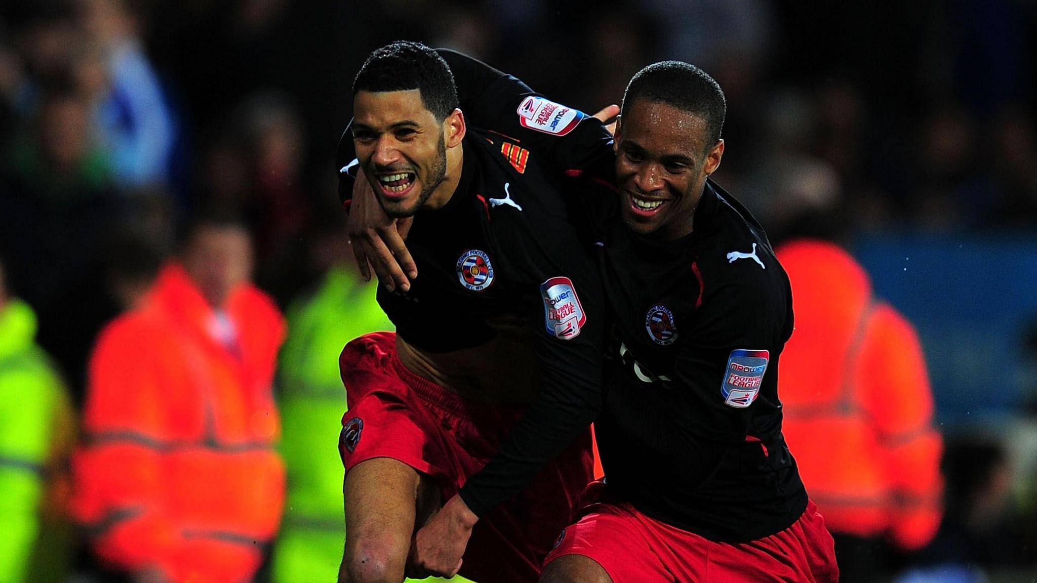 Jobi McAnuff celebrates with his team-mate after scoring against Cardiff in the second leg Championship play-off semi-final in 2011