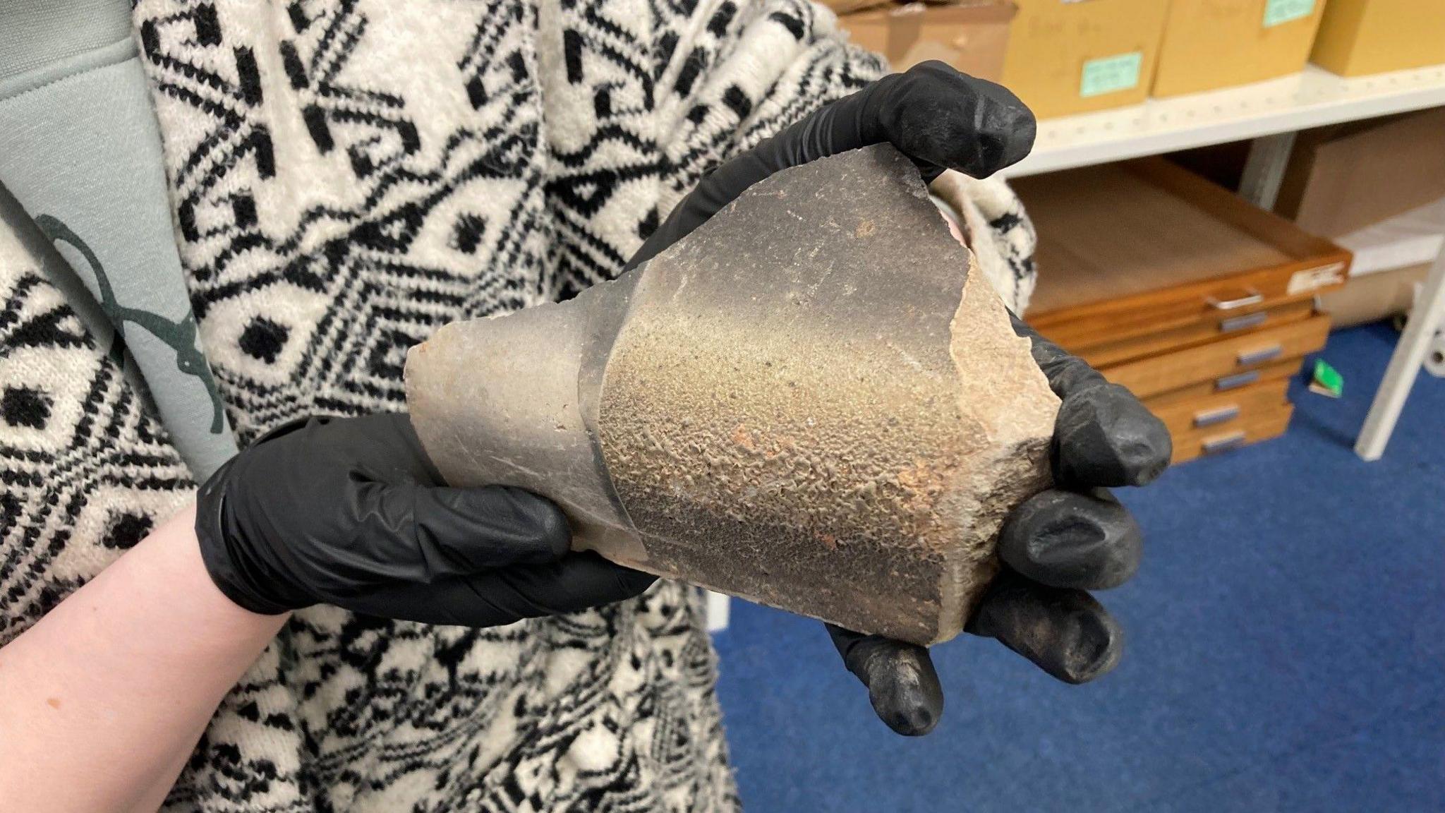 A fragment of scorched roof tile from the Hiroshima Atomic bomb attack in 1945