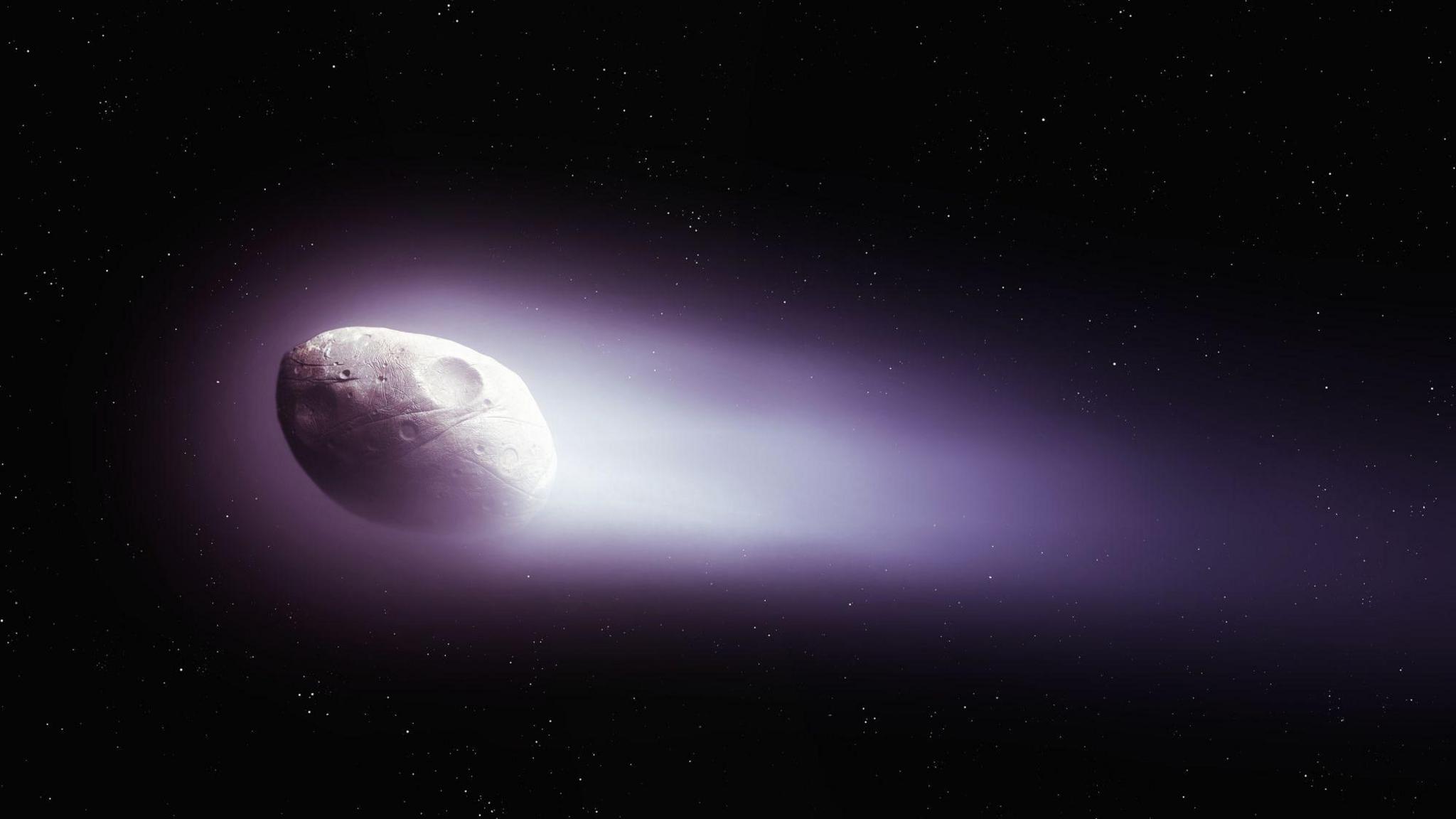 The nucleus and tail of Halley's Comet in the blackness of space