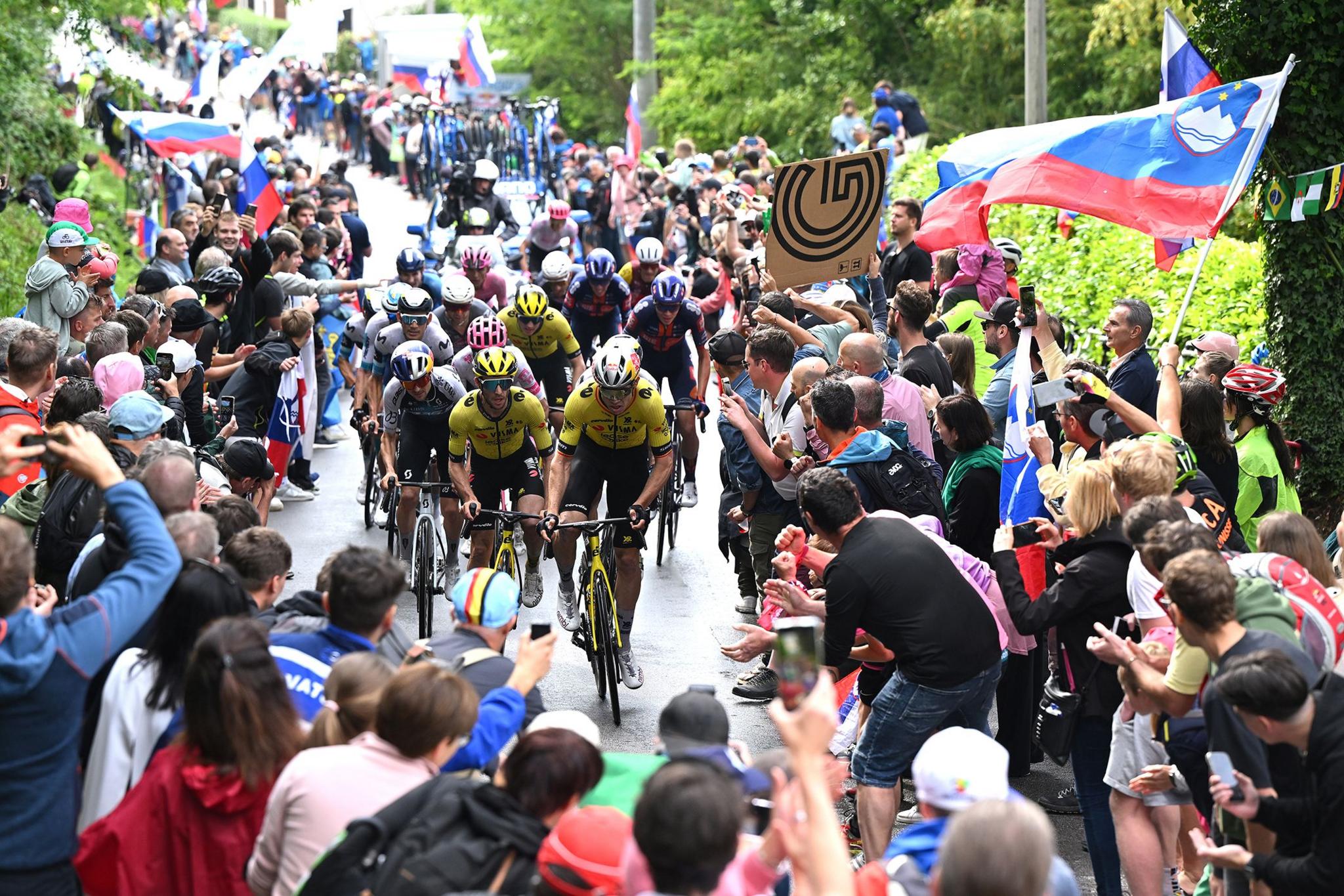 Great Britain's Simon Yates and Belgium's Wout Van Aert lead the peloton while fans cheer during the 108th Giro d'Italia 2025, Stage 14 a 195km stage from Treviso to Nova Gorica. Photo by Dario Belingheri