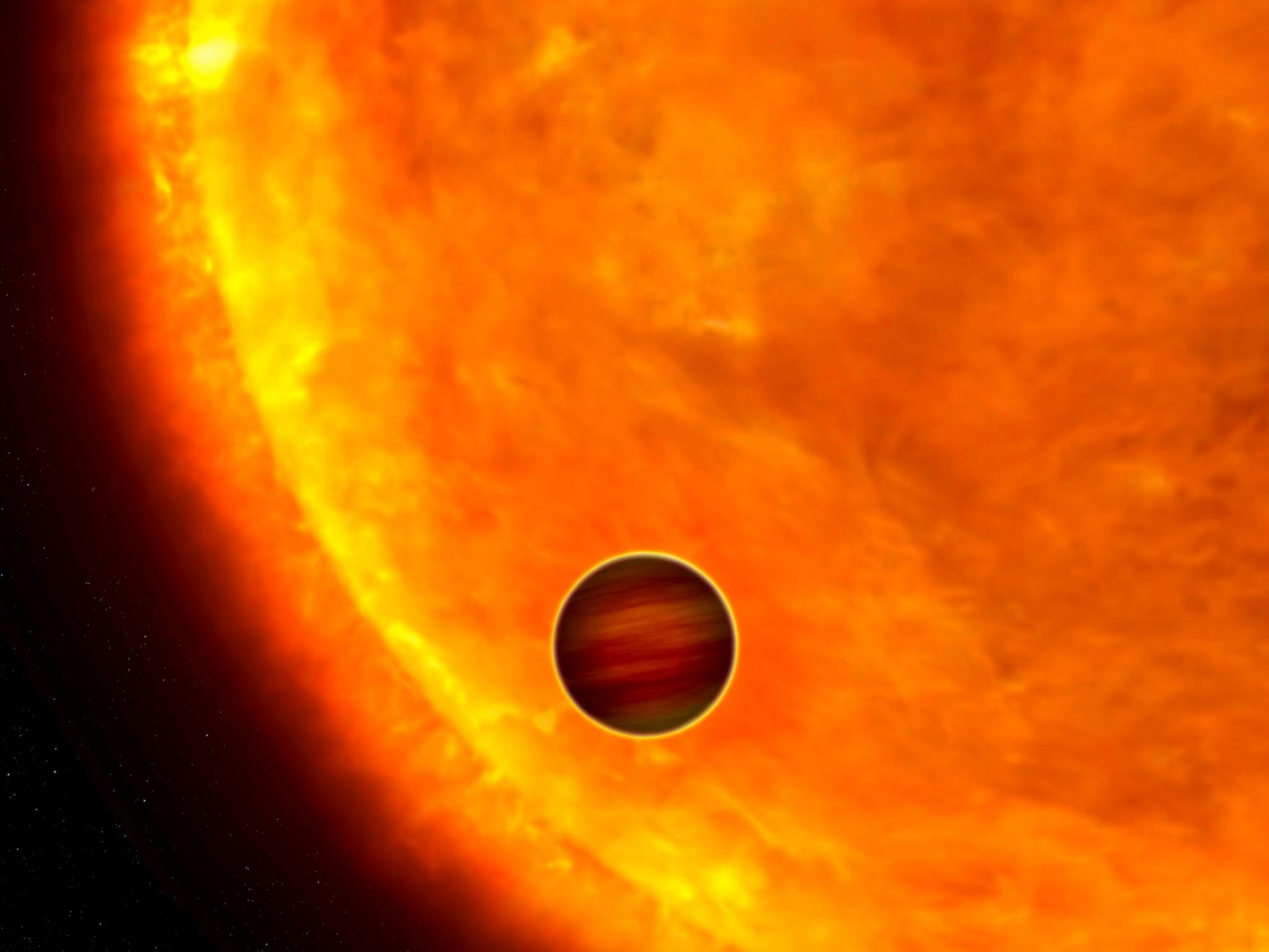 A planet moves across a star similar to our Sun.