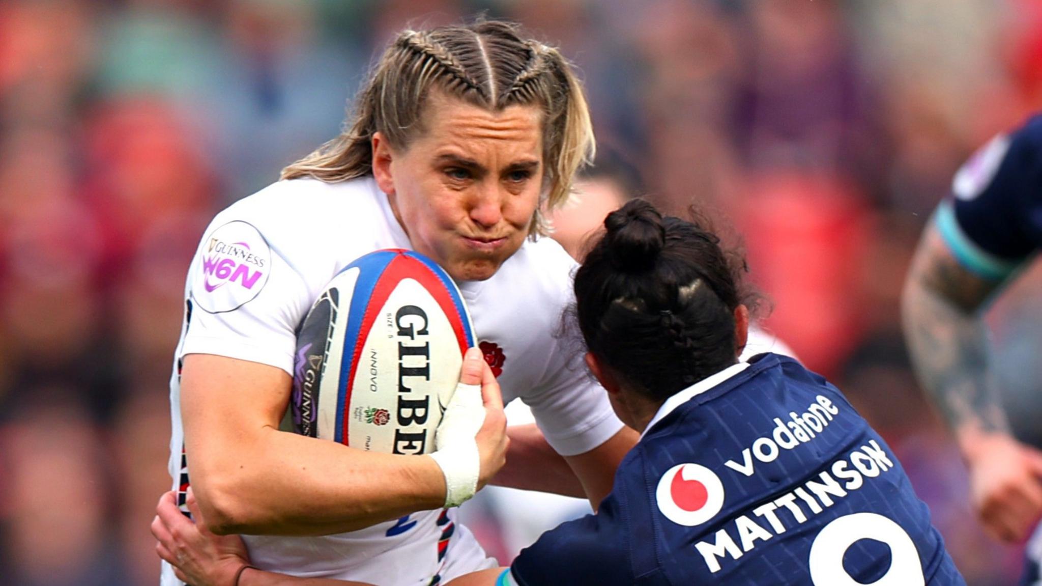 Claudia Moloney-MacDonald is tackled playing for England