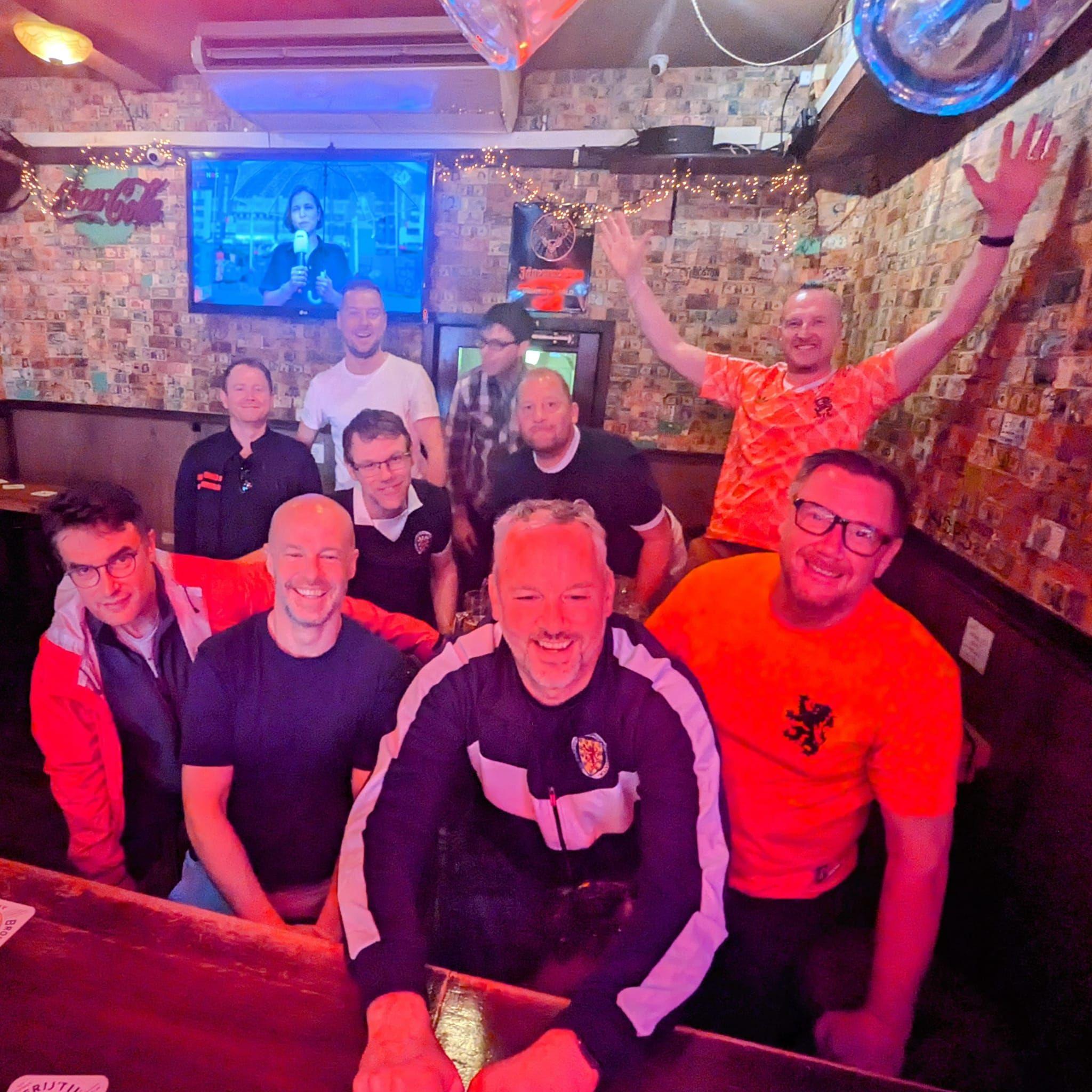 Cycling friends in an Amsterdam bar