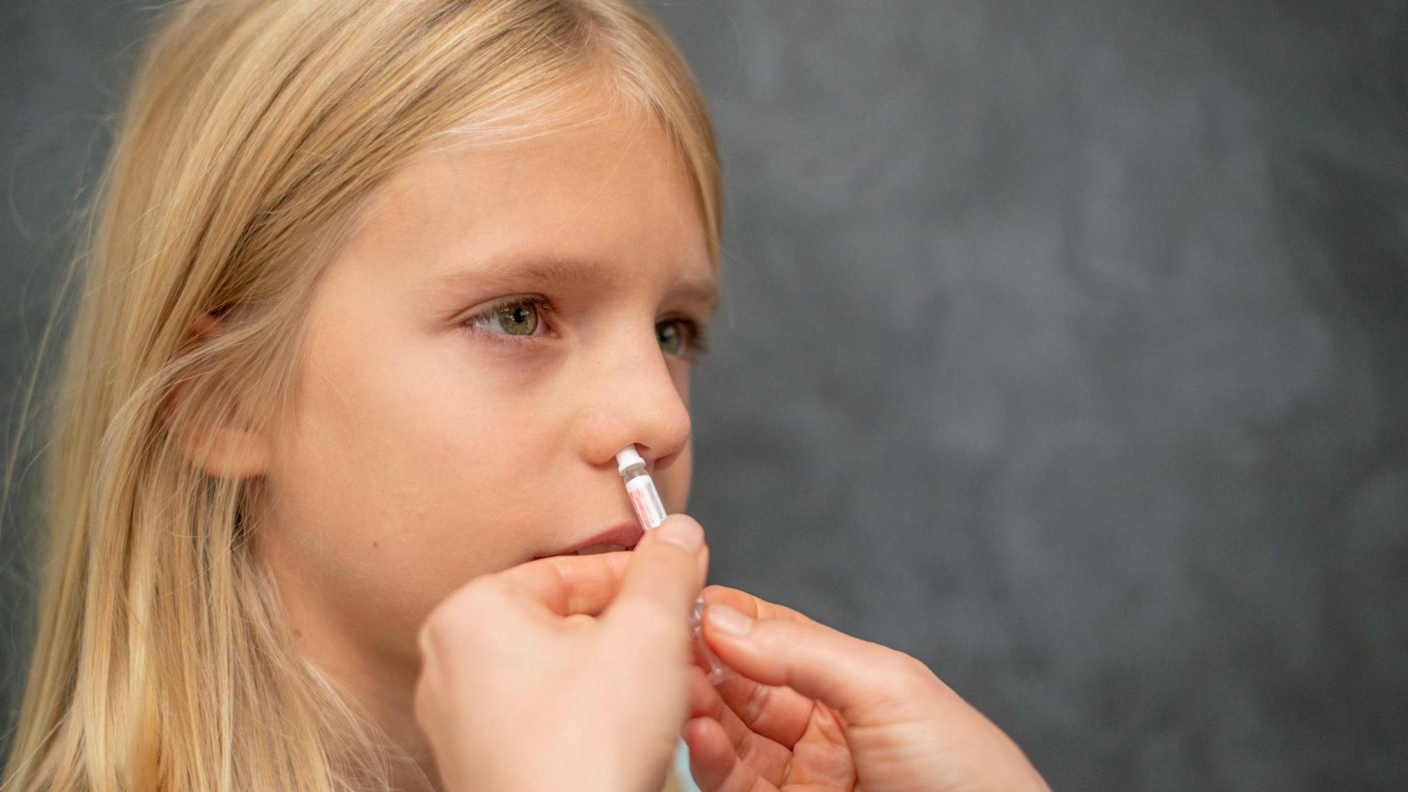 Child getting vaccinated against the flu