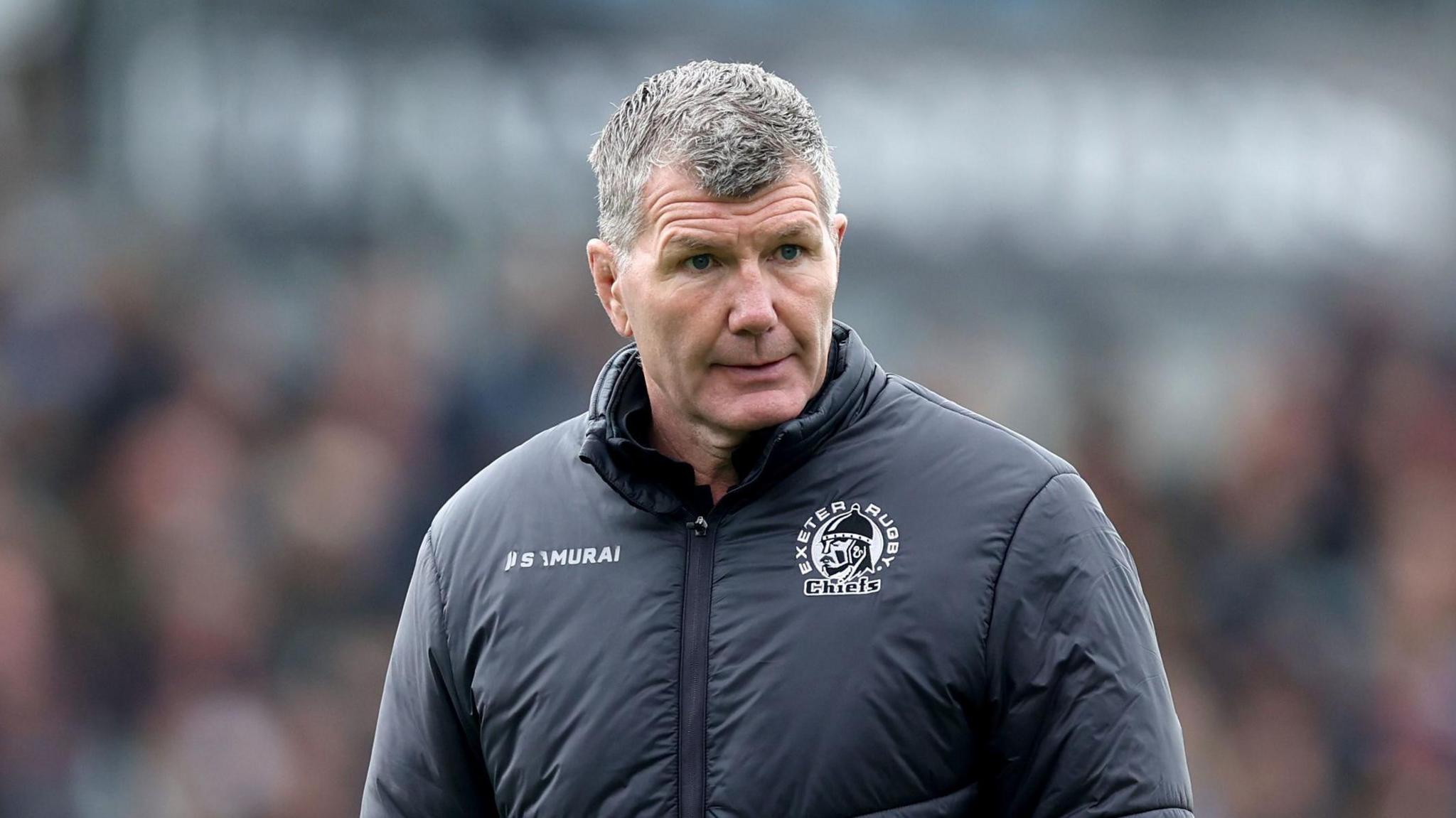 Rob Baxter standing on the pitch during a match