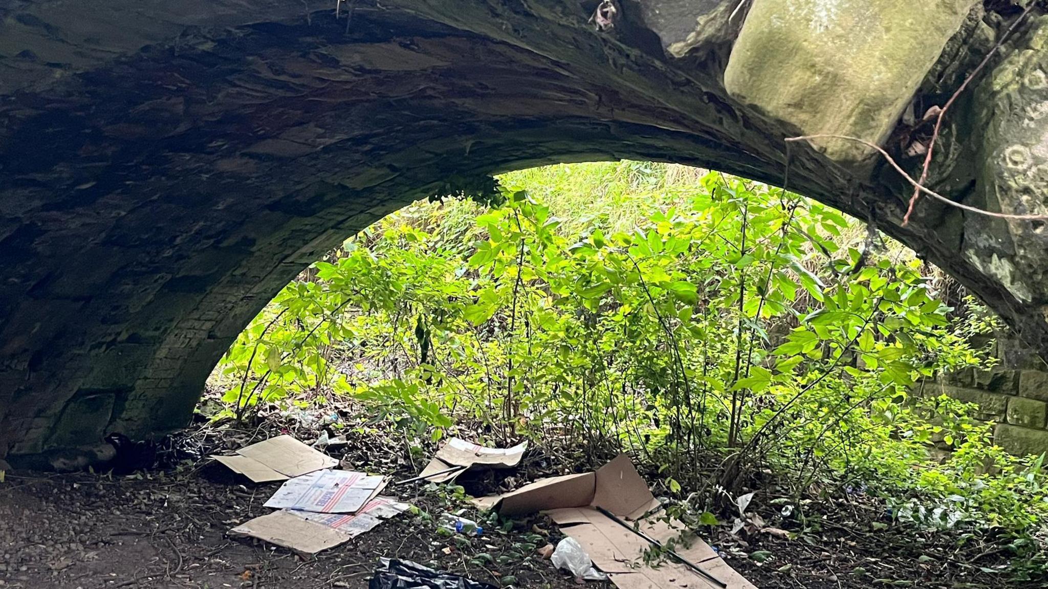 Litter underneath the ancient ruins of the old Trent Bridge in Nottingham