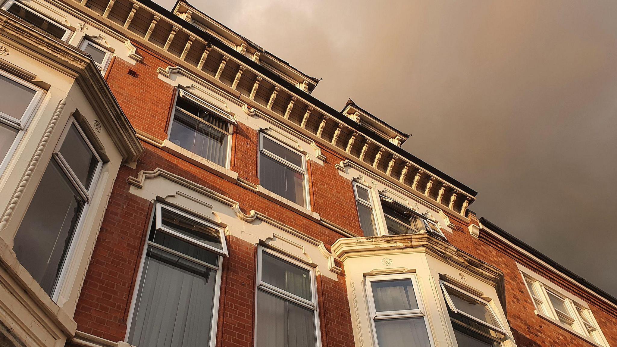 Homes under dark skies