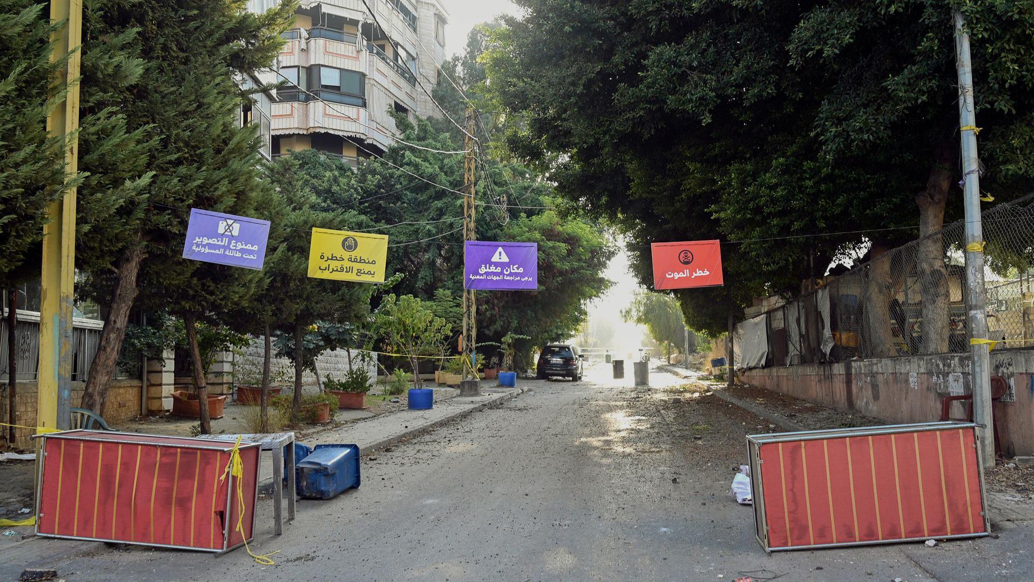 Signs at the entrance to part of the Dahieh warn it is dangerous to enter or take photographs without permission from Hezbollah.