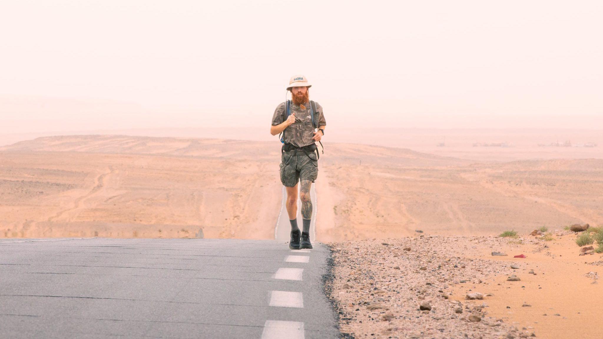 Russell Cook running in Africa