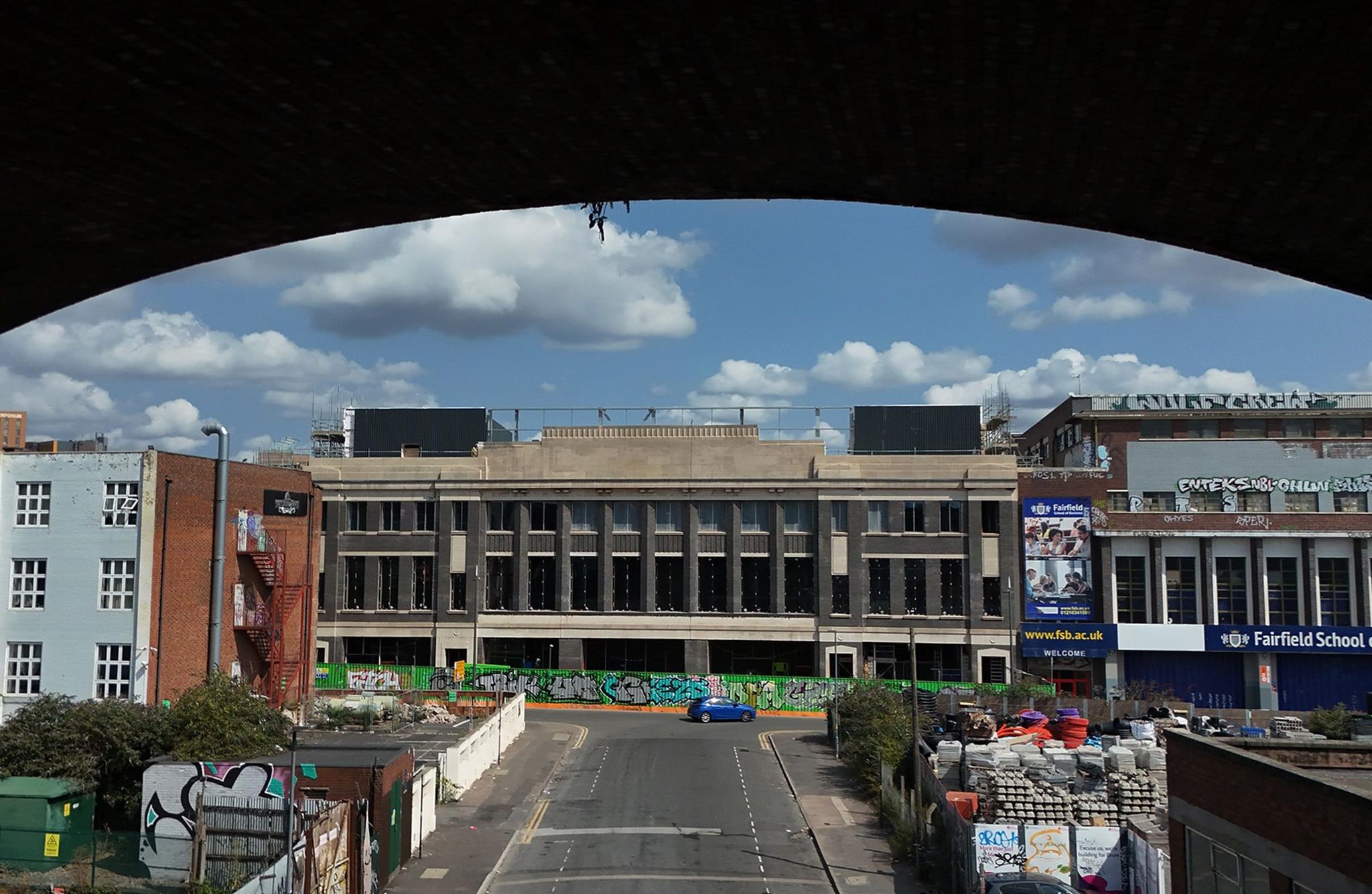 Former Typhoo tea factory is an industrial building flanked by other factories in the Digbeth area of Birmingham