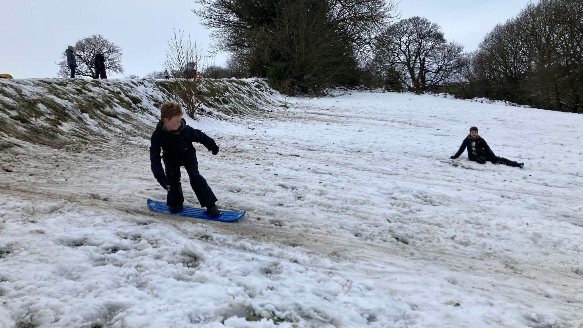 Alex, 12, snowboarding in Bingham Park in Sheffield