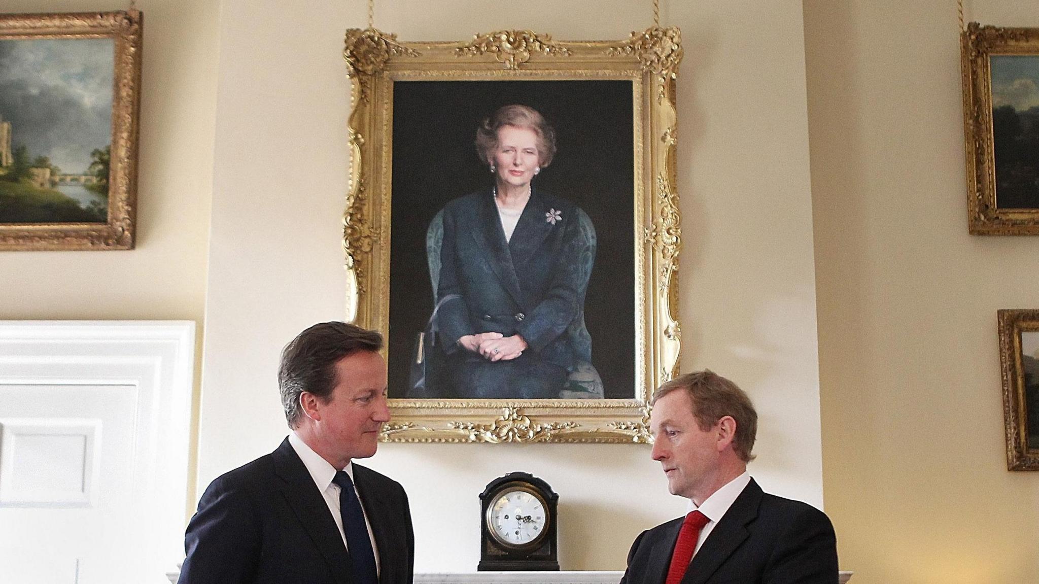 David Cameron and Irish Taoiseach Enda Kenny next to portrait of Margaret Thatcher in 2011