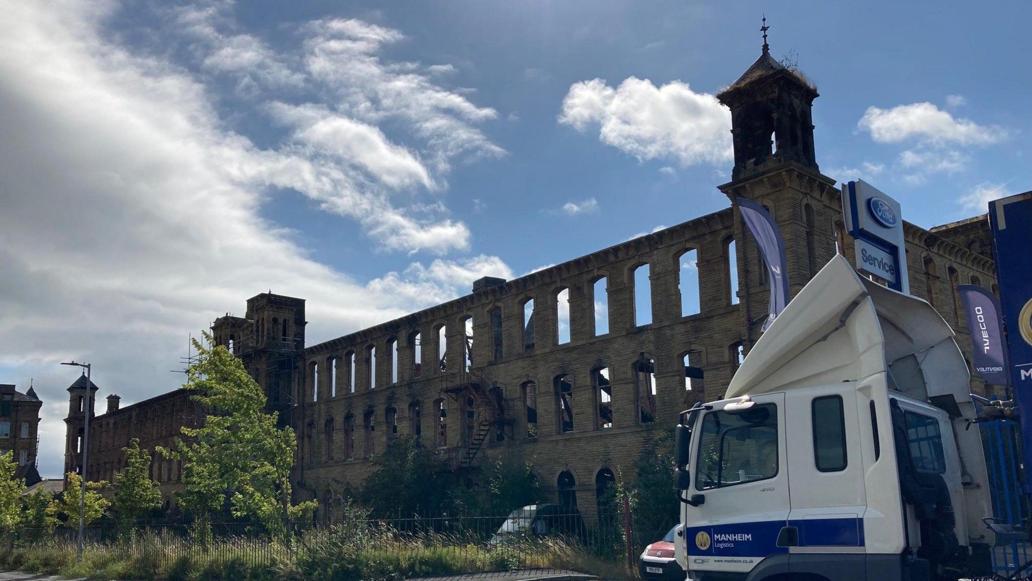 The burnt out front of Genappe Mill in the Grade II* listed complex