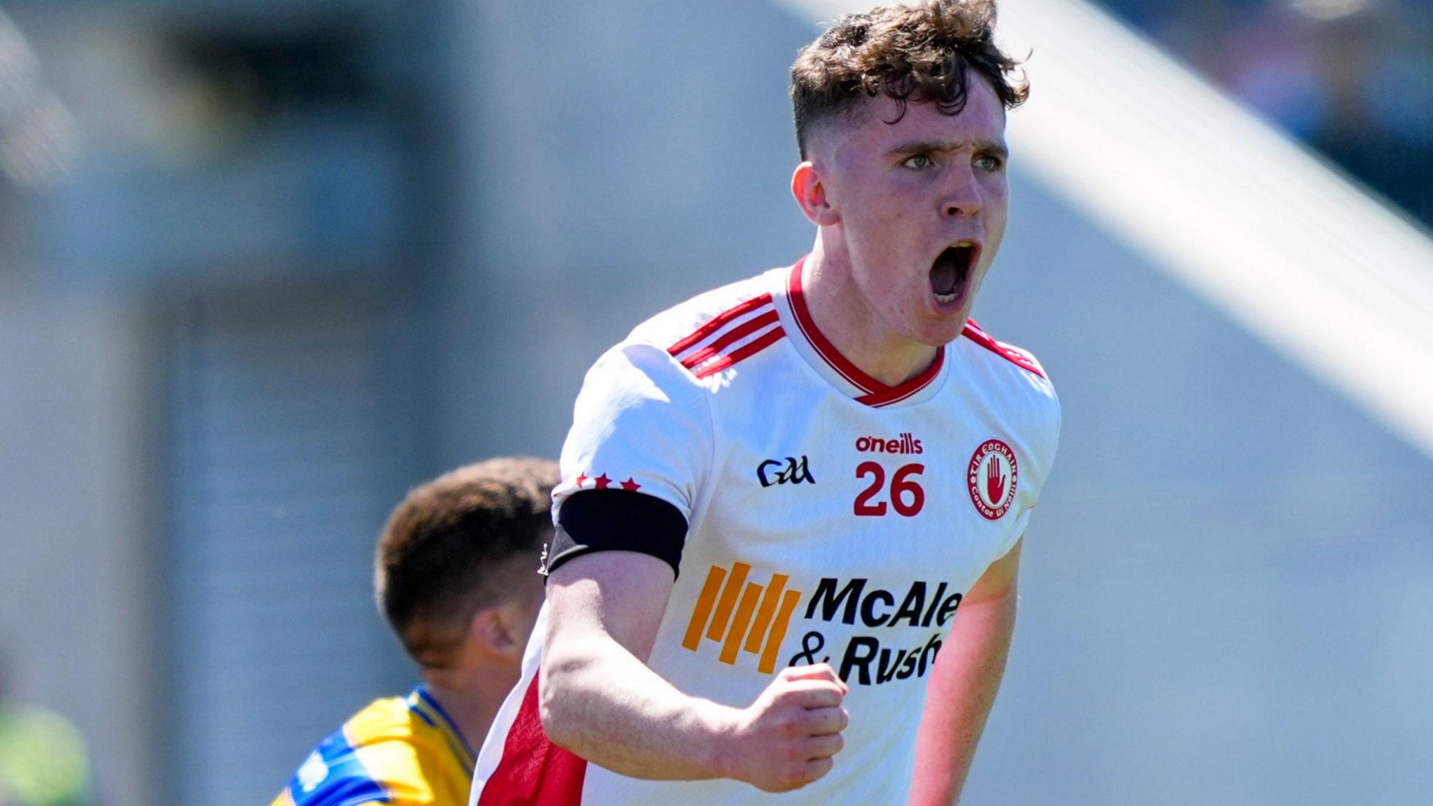 Eoin McElholm celebrates scoring a goal