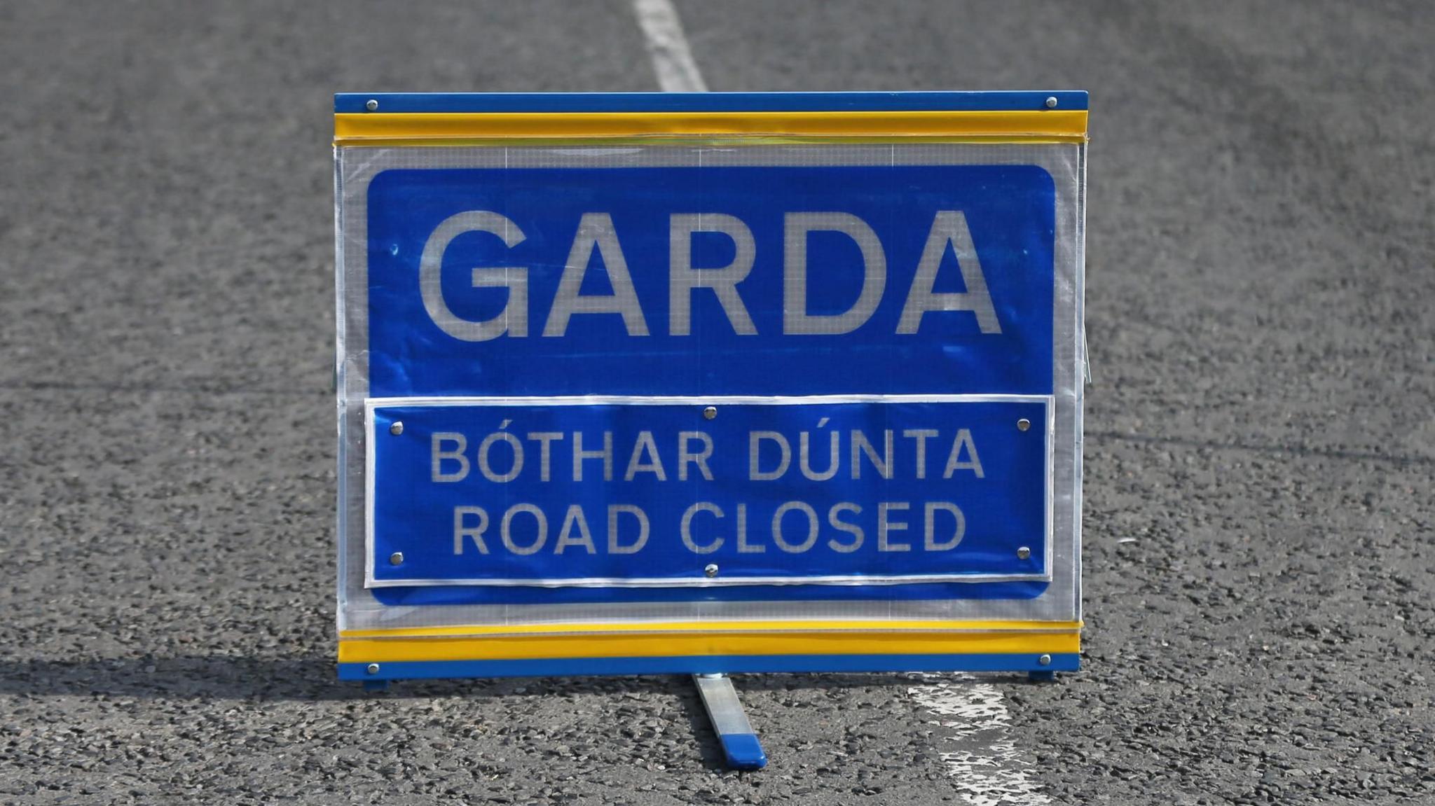 Garda road closure sign