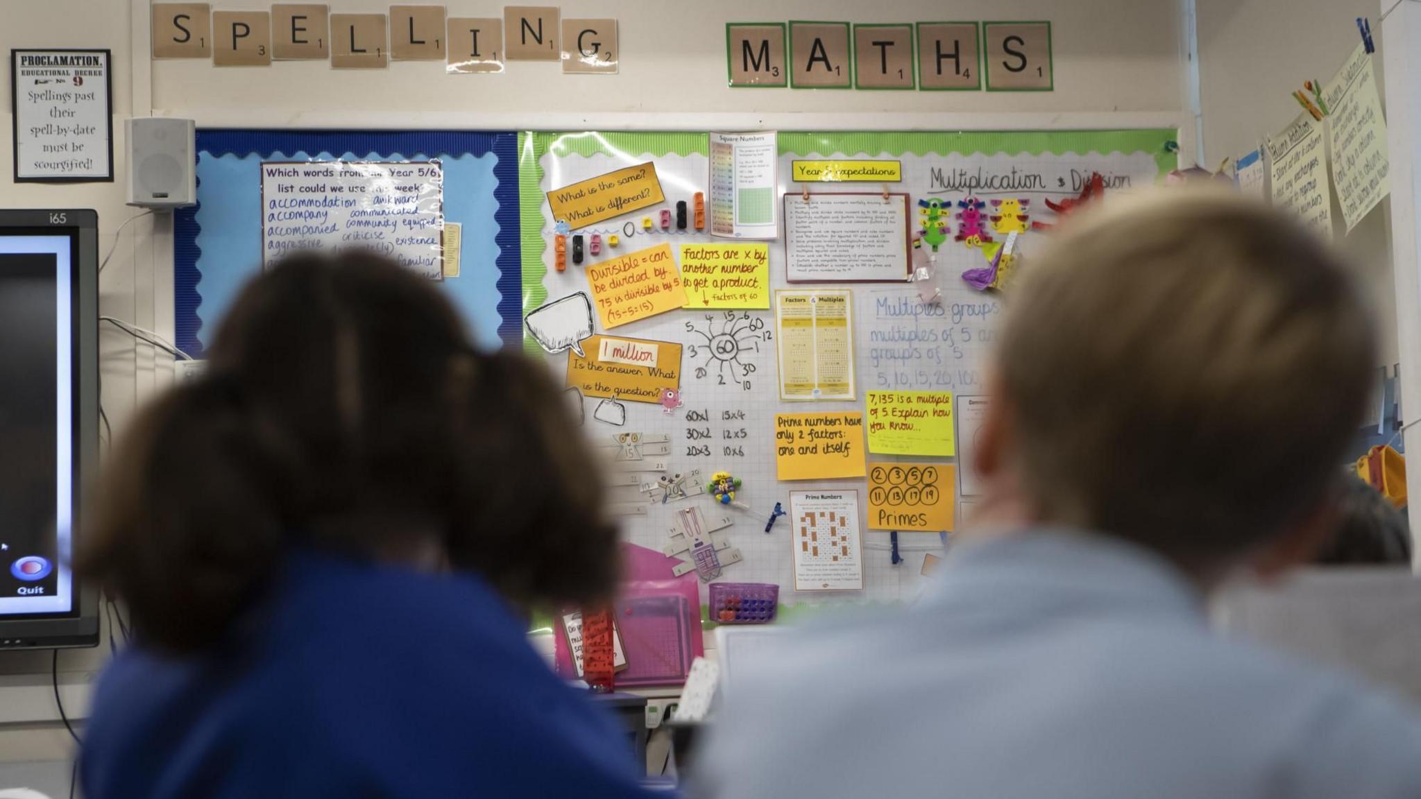 Two pupils sitting in a classroom