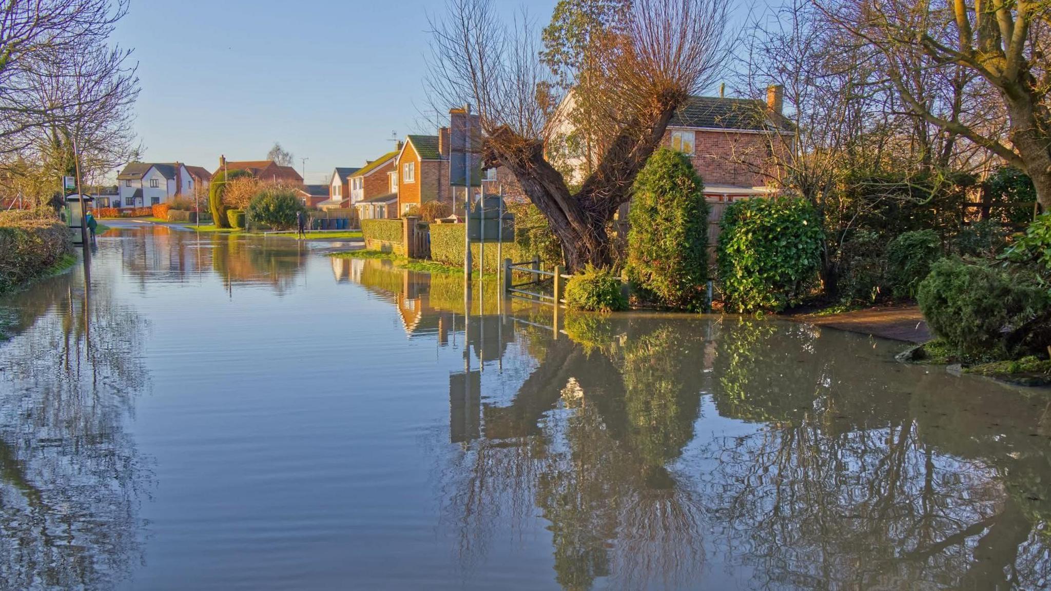 Houses surrounded by flood waters